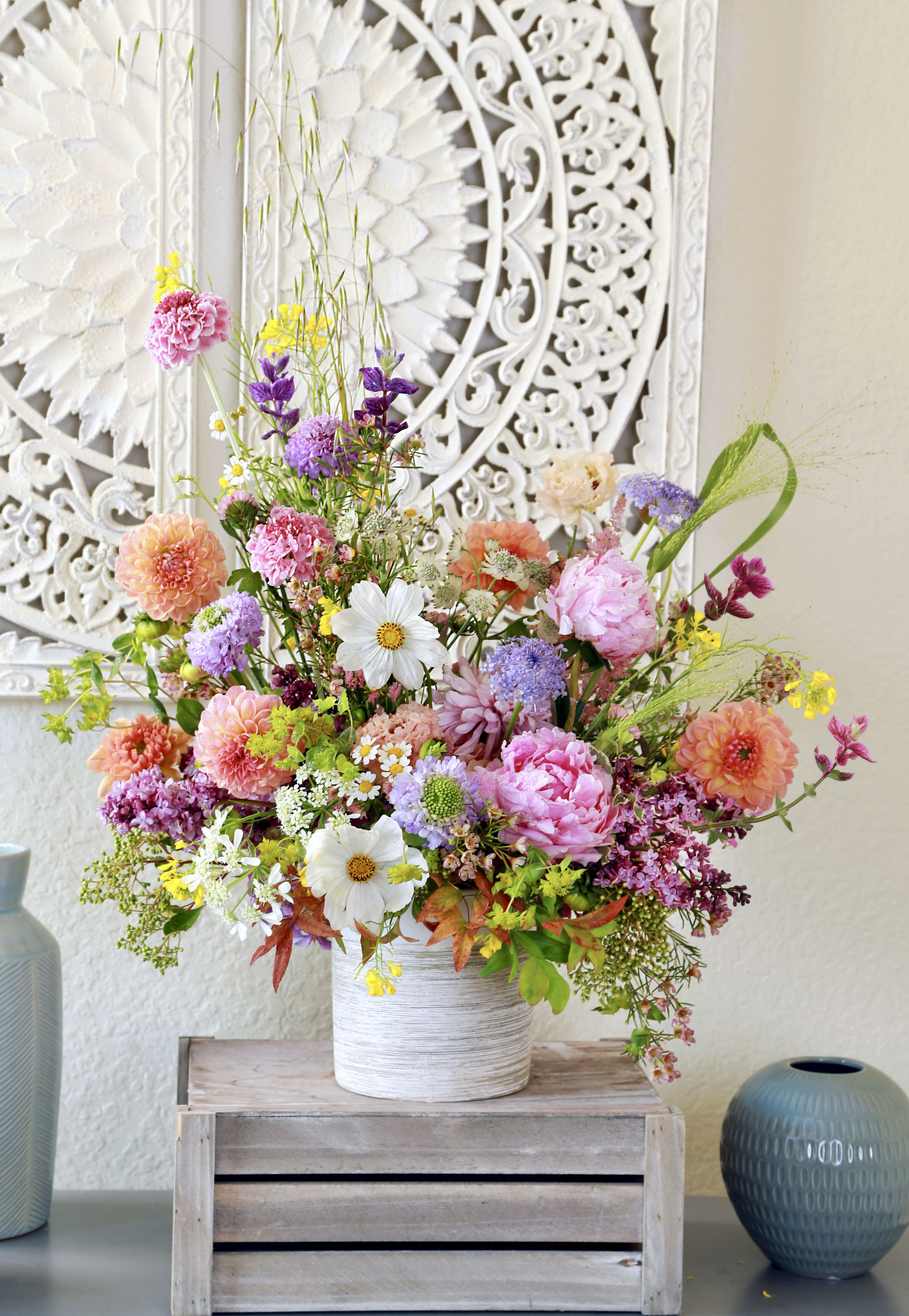 Mother's day special designer edition- Private Garden  - A lush and garden-style arrangement designed exclusively for Mother’s Day, featuring premium lilac, peonies, assorted scabiosa, hydrangeas, dahlias, lisianthus, and an abundance of seasonal blooms ,.  thoughtfully designed signature couture garden style  