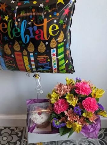Birthday balloon with a flower bouquet and teddy bear gift box