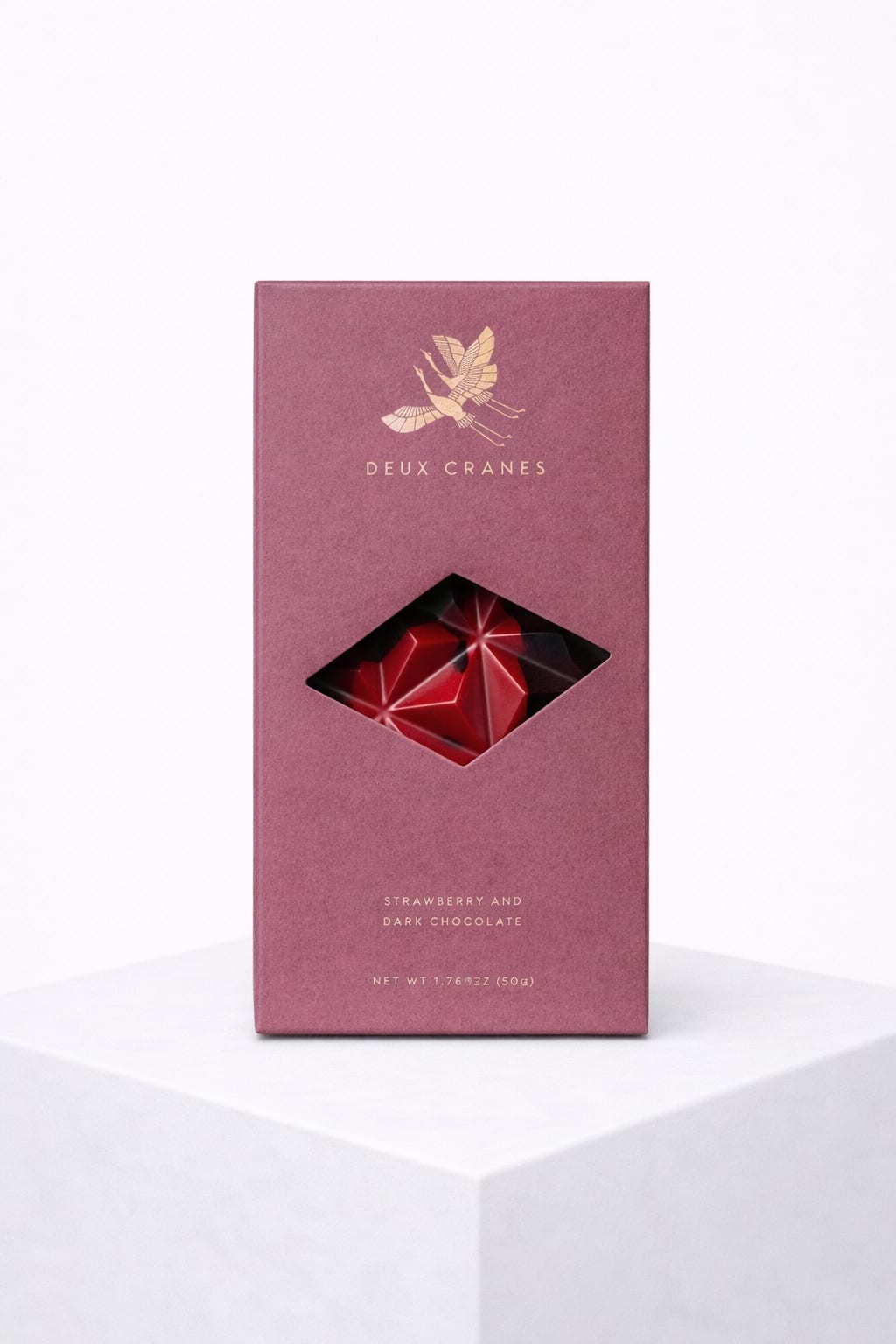 Strawberry &amp; Dark Chocolate - A bold yet romantic classic with a modern twist. Rich, velvety dark chocolate meets the bright, natural sweetness of strawberries for a flavor that’s both indulgent and refreshing. Each bite offers deep cocoa notes balanced by fruity vibrance, creating a chocolate experience that feels luxurious yet playful.  Beautifully packaged and visually striking, this bar makes a standout gift—or a well-deserved treat just for you.  Flavor Notes: Deep dark cocoa • Bright strawberry • Smooth finish Perfect For: Chocolate lovers, romantic gifts, dessert pairings 