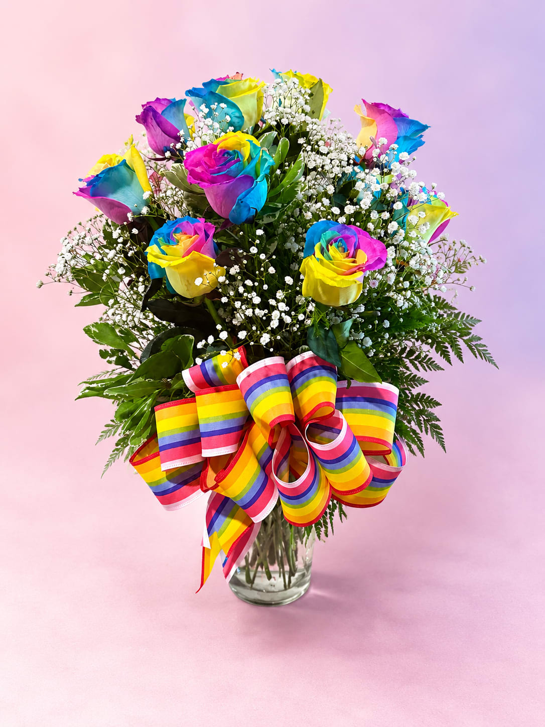 Love in full color - Vibrant, playful, and impossible to miss, Love in Full Color is designed with stunning rainbow roses, airy baby’s breath, and rich greenery, all accented with a bold rainbow ribbon for the perfect finishing touch. Bursting with color and personality, this arrangement celebrates joy, love, individuality, and self-expression in the most beautiful way.