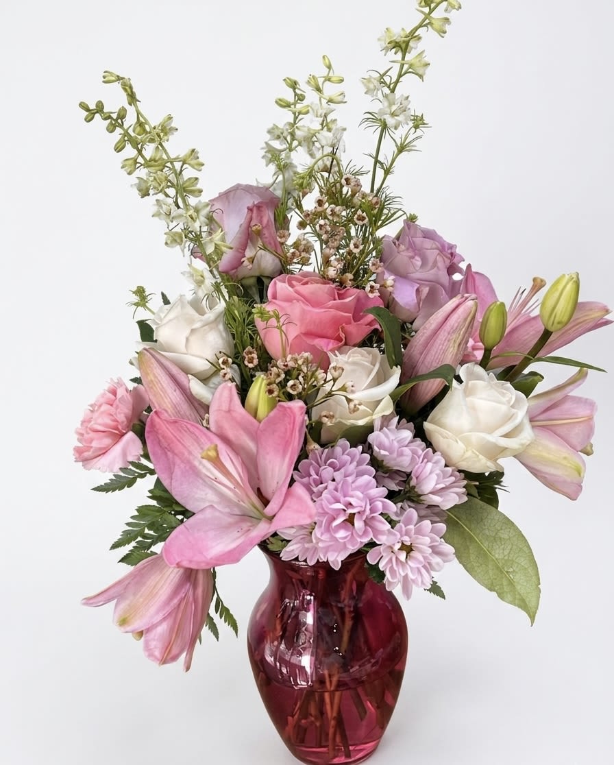 Blushing Garden Radiance - Blushing Garden Radiance Celebrate life’s special moments with the Blushing Garden Radiance arrangement. Featuring a lush collection of premium blooms in a harmonious blend of soft pastels and vibrant tones, this arrangement is designed to bring a touch of elegance to any setting. Whether you are celebrating a birthday, an anniversary, or simply want to brighten someone's day, this versatile bouquet is the perfect choice for any occasion.