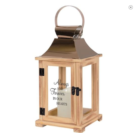 LANTERN "ALWAYS AND FOREVER" - This lantern is made from quality wood and stainless steel cooper finish top. It features a built in automatic timer which runs for 6 hours on and 18 hours off and is uv printed with a sentimental quote. Do not use fire burning candles in the lantern, suitable for hanging or free standing use inside. recommended as an accent in floral arrangement for many occasions. W: 6.25" H: 13.5" D: 6.25"