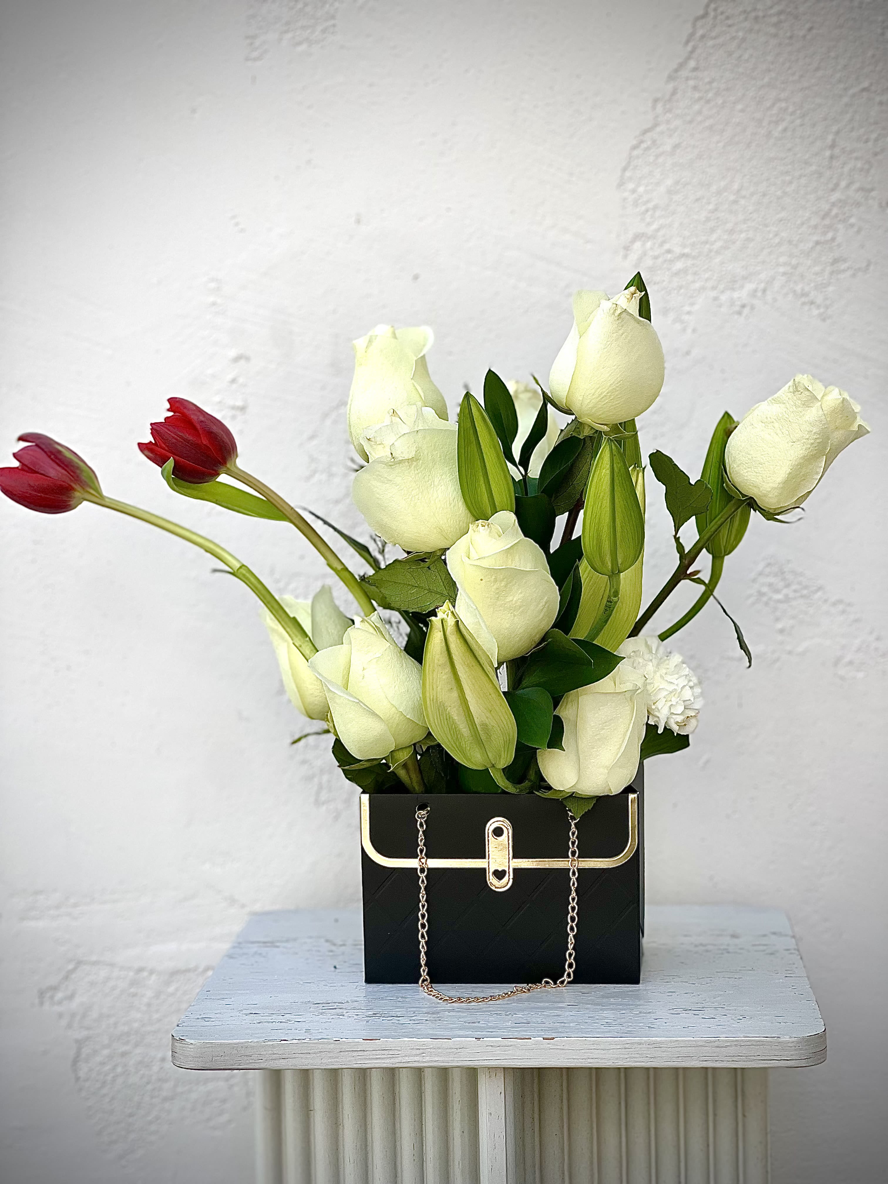 Gunny Roses  - Embrace rustic charm with our Blush &amp; Ivory Rose Burlap Bouquet. Featuring a delicate mix of blush and ivory roses, this arrangement is elegantly wrapped in natural burlap and tied with a touch of greenery for a beautifully organic look. Perfect for weddings, anniversaries, or any heartfelt occasion, this bouquet combines timeless beauty with rustic sophistication. Order now to share the warmth and elegance of this handcrafted arrangement!