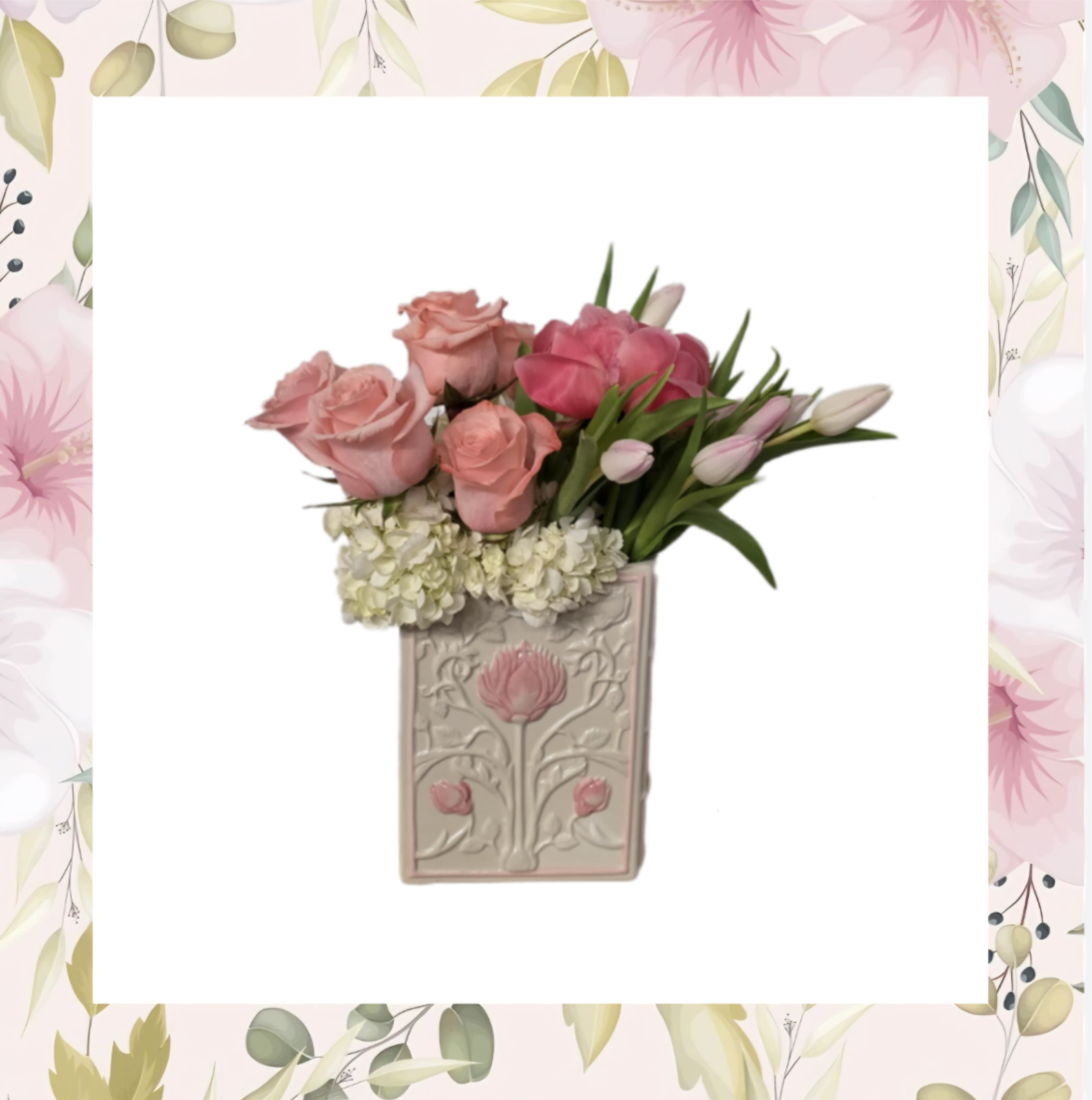 Pink roses and tulips arranged in a decorative vase