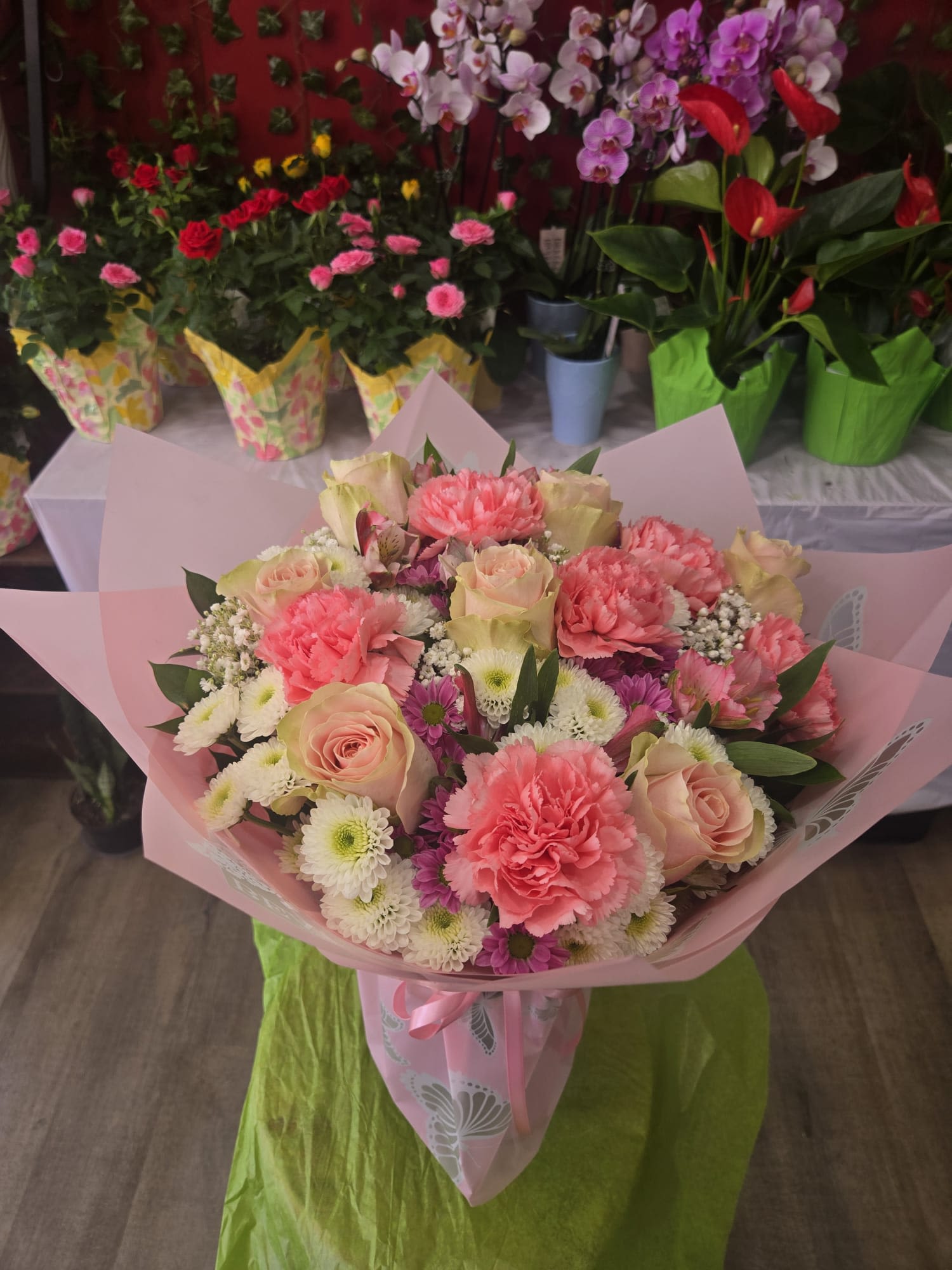 Korean Wrapped series - Pink Mixed - Light pink roses are on display in this lovely mixed arrangement, wrapped in Korean Paper with a sheer bow. 