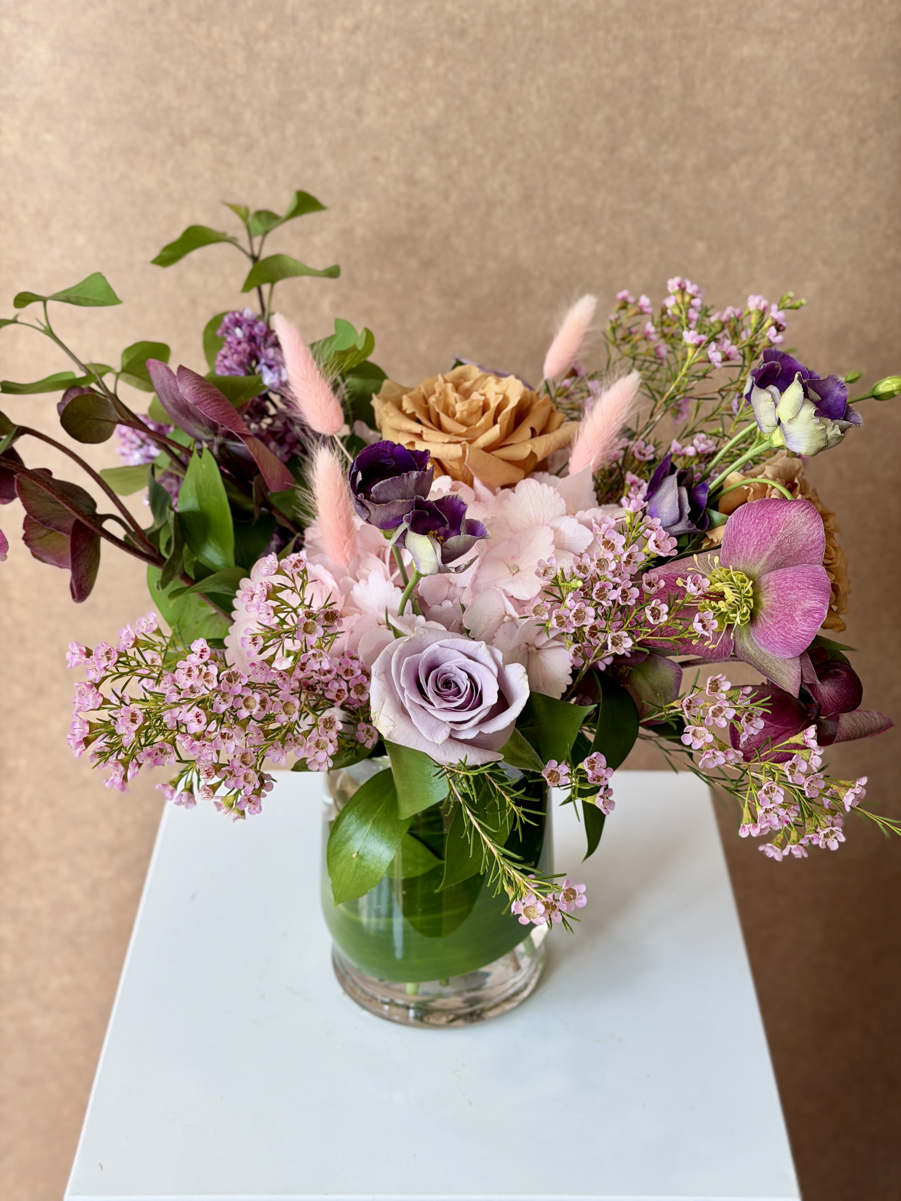 Daphne - Thoughtfully curated color palette for a lush, springy arrangement in pink, lavender and caramel.