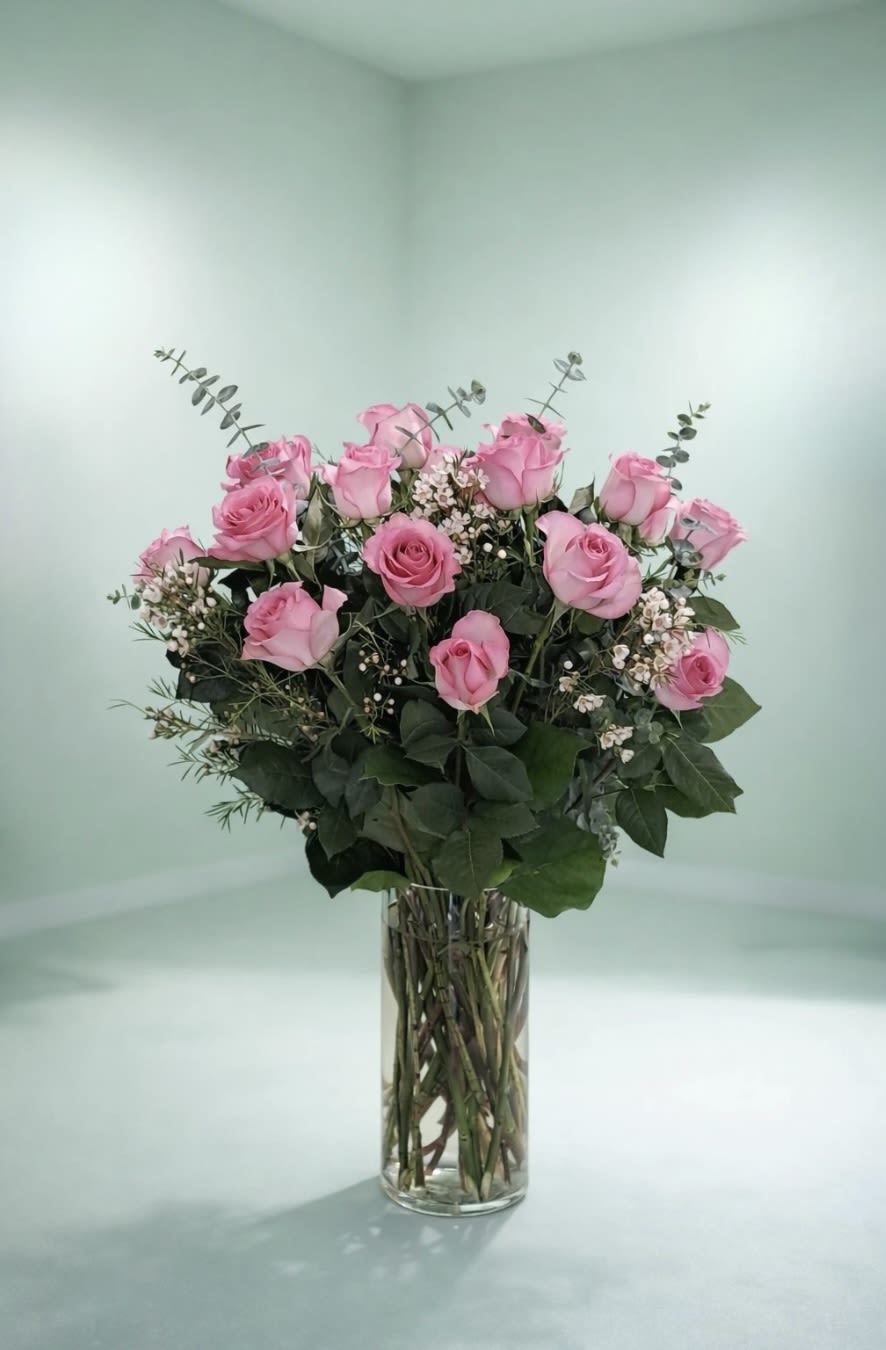 A Delicate Romance  - Show they’re amazing with these gorgeous pink roses that'll make them smile every time they walks by. Perfect for special occasions or just because they deserves it!