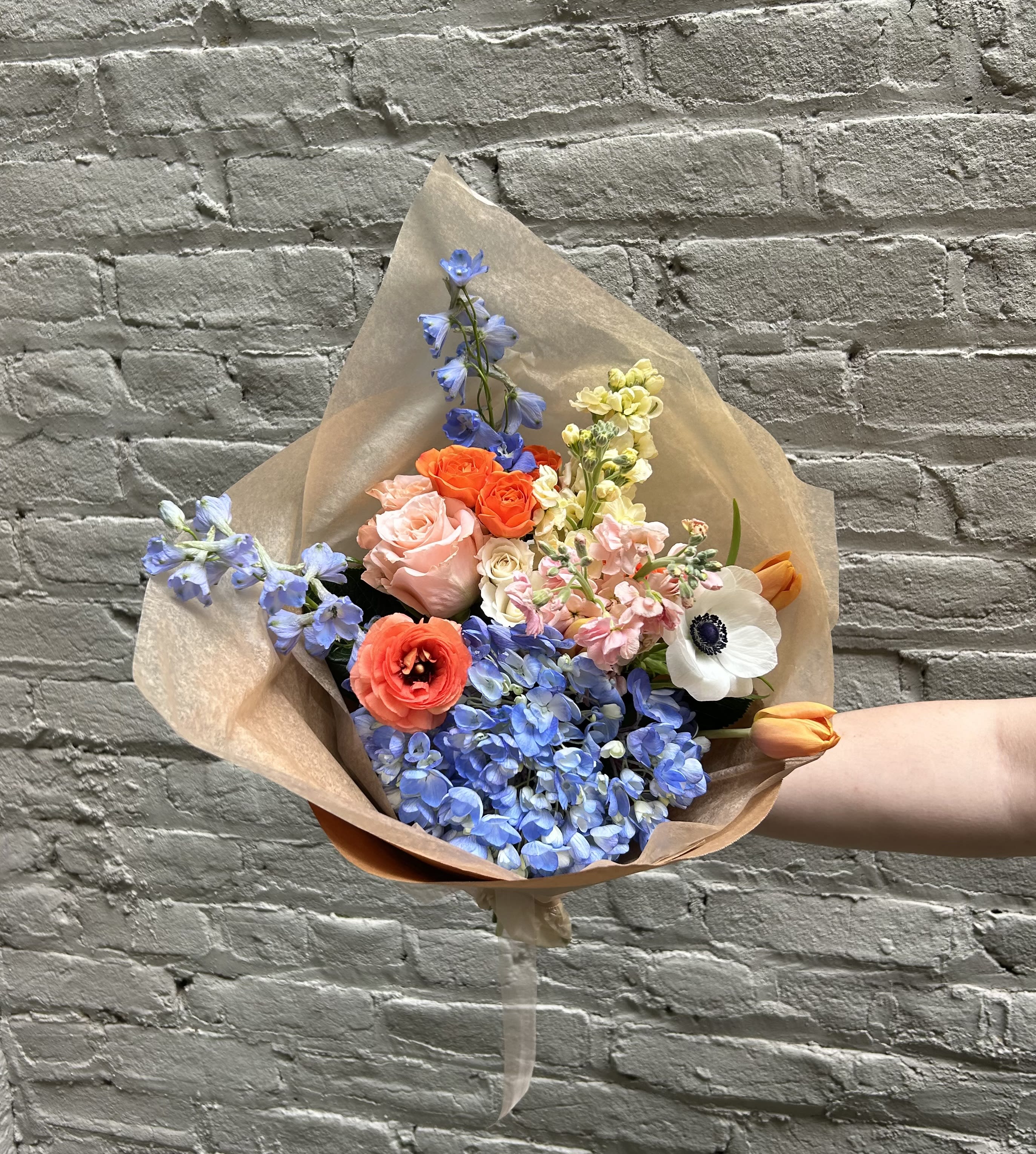 Wahoo! Bouquet - This fun, hand-wrapped bouquet is the perfect gift for your favorite UVA student!  Not only does is sport the classic blue and orange UVA color scheme, but it will come with a transportable water source to ensure the blooms stay fresh and lovely.