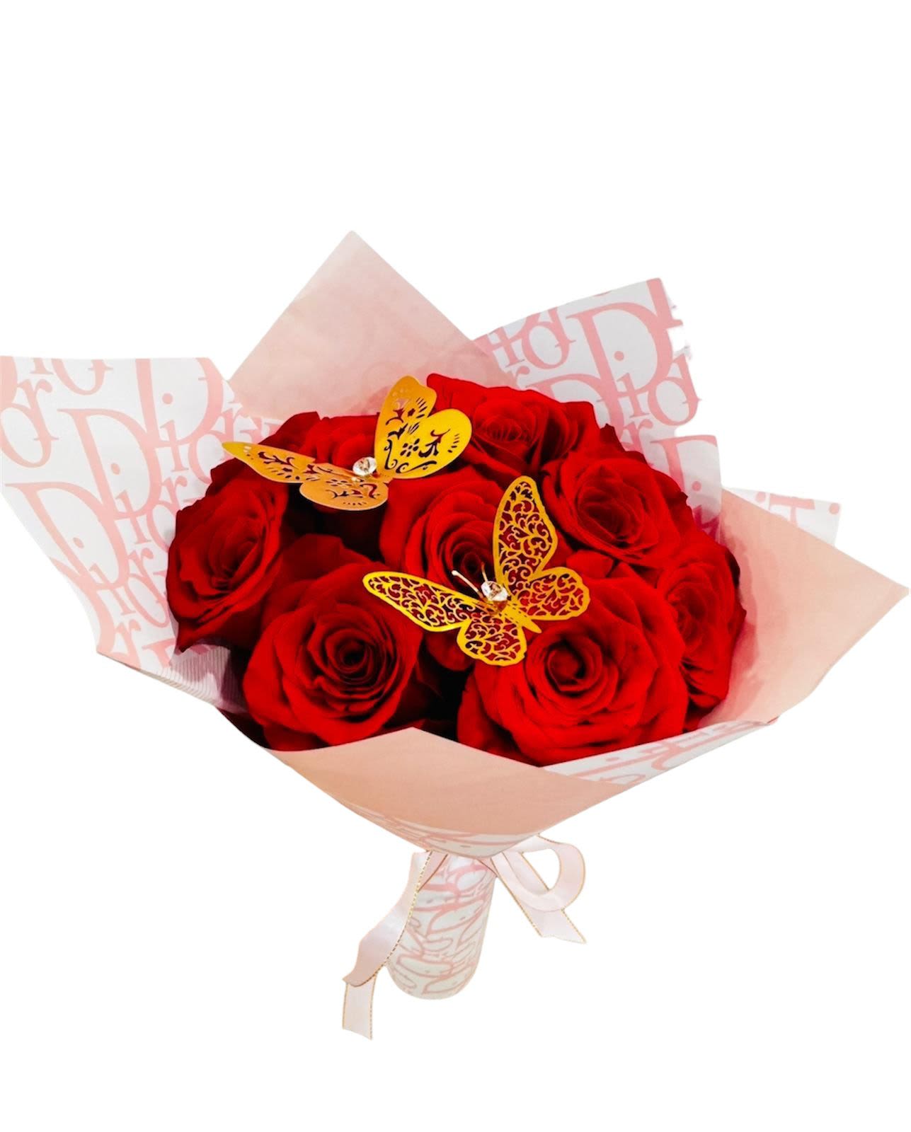 Butterfly  - A beautiful arrangement for the girls   Note: The wrapping paper may vary, but it would be pink!