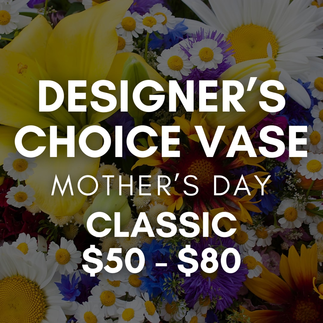 Designer’s Choice Vase Arrangement - Classic - Let our designers create something beautiful for Mother’s Day using the freshest flowers available today. Each vase arrangement is custom designed in Saville’s signature style using a seasonal mix of fresh blooms, greenery, and natural textures selected daily from our cooler.  Every arrangement is one-of-a-kind and thoughtfully designed to feel fresh, full, and beautiful for the occasion. Flower varieties and overall design will vary based on availability during Mother’s Day week.