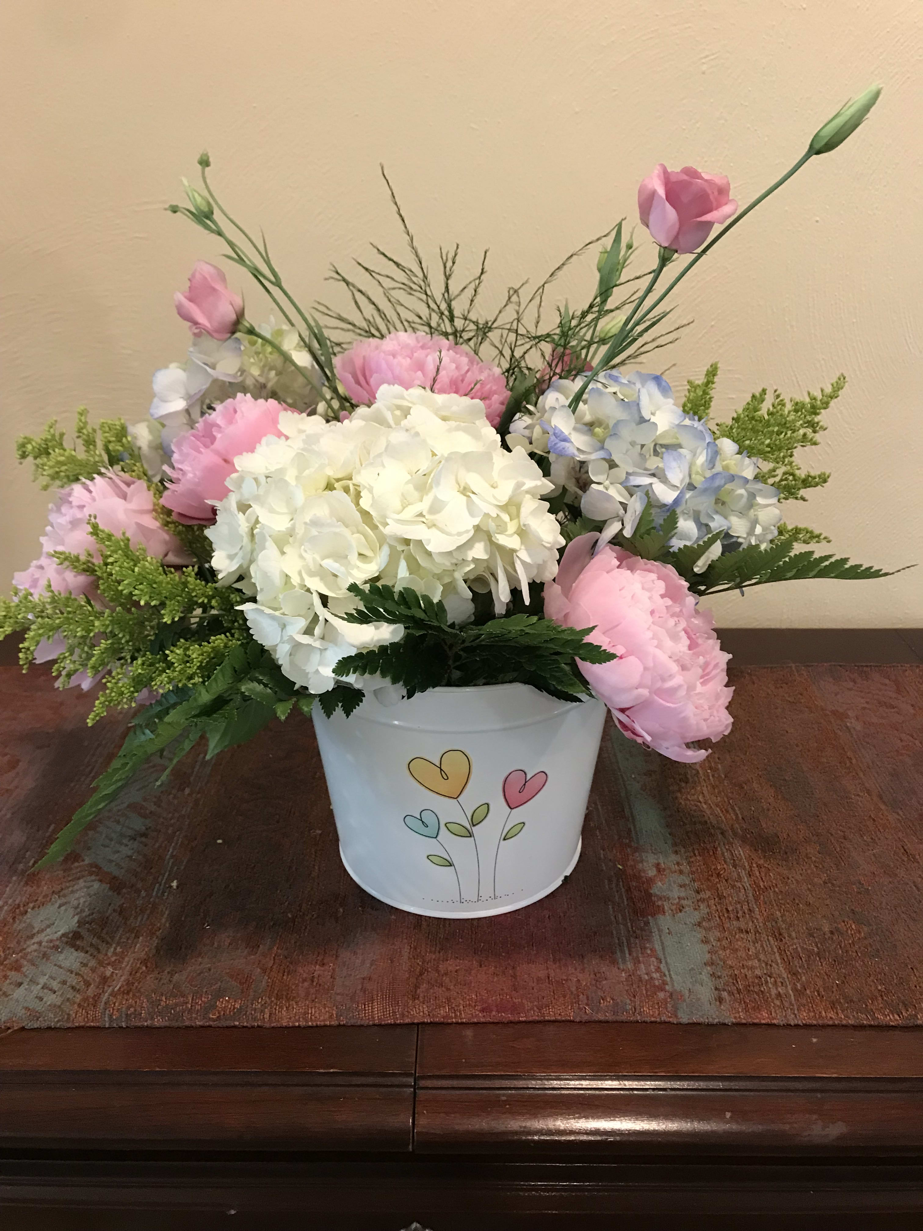 Spring Planter - Perfect for spring/mother’s day. A mix of peonies and hydrangeas will make someone’s day. Delivered in a keepsake planter 