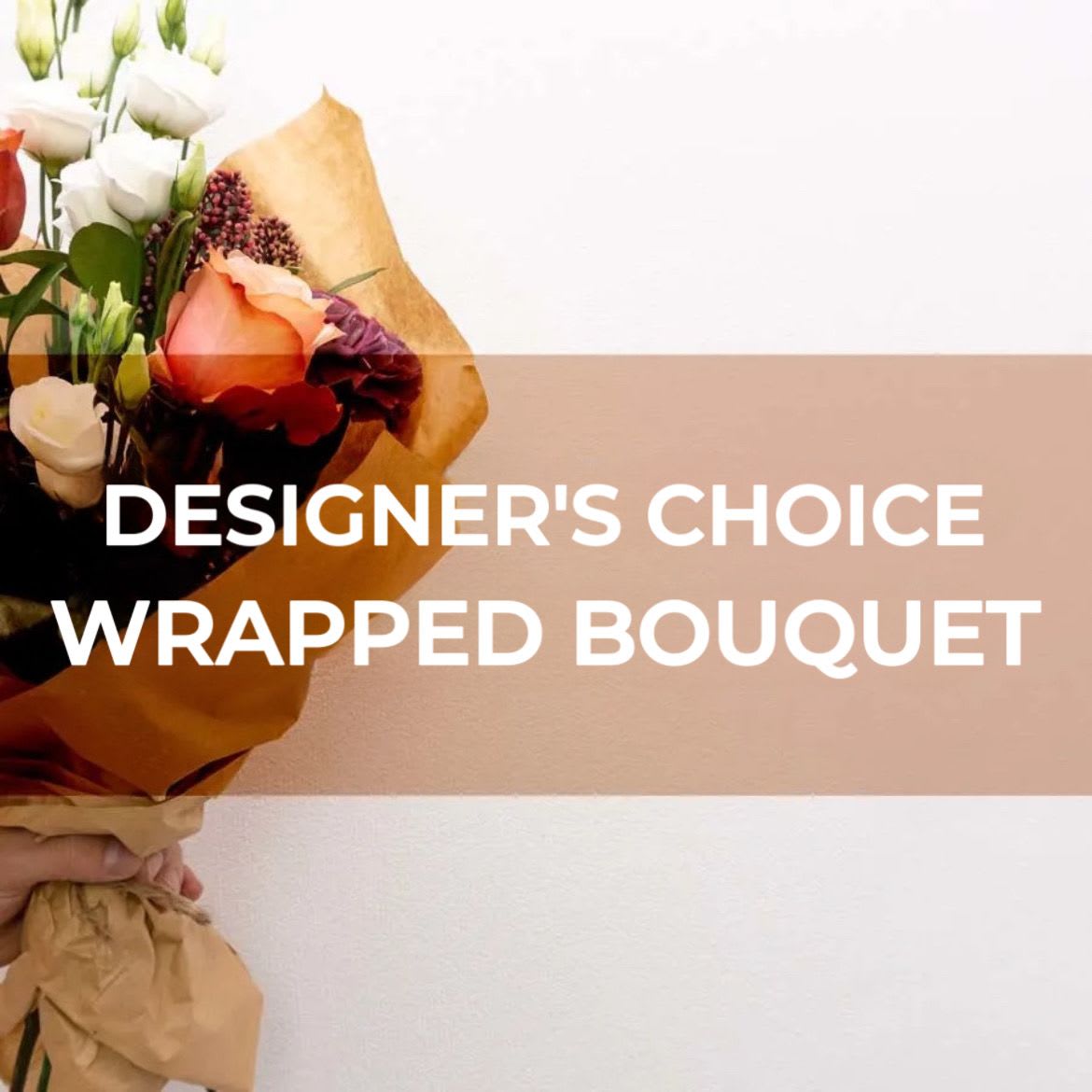 Wrapped bouquet of mixed roses and white blooms