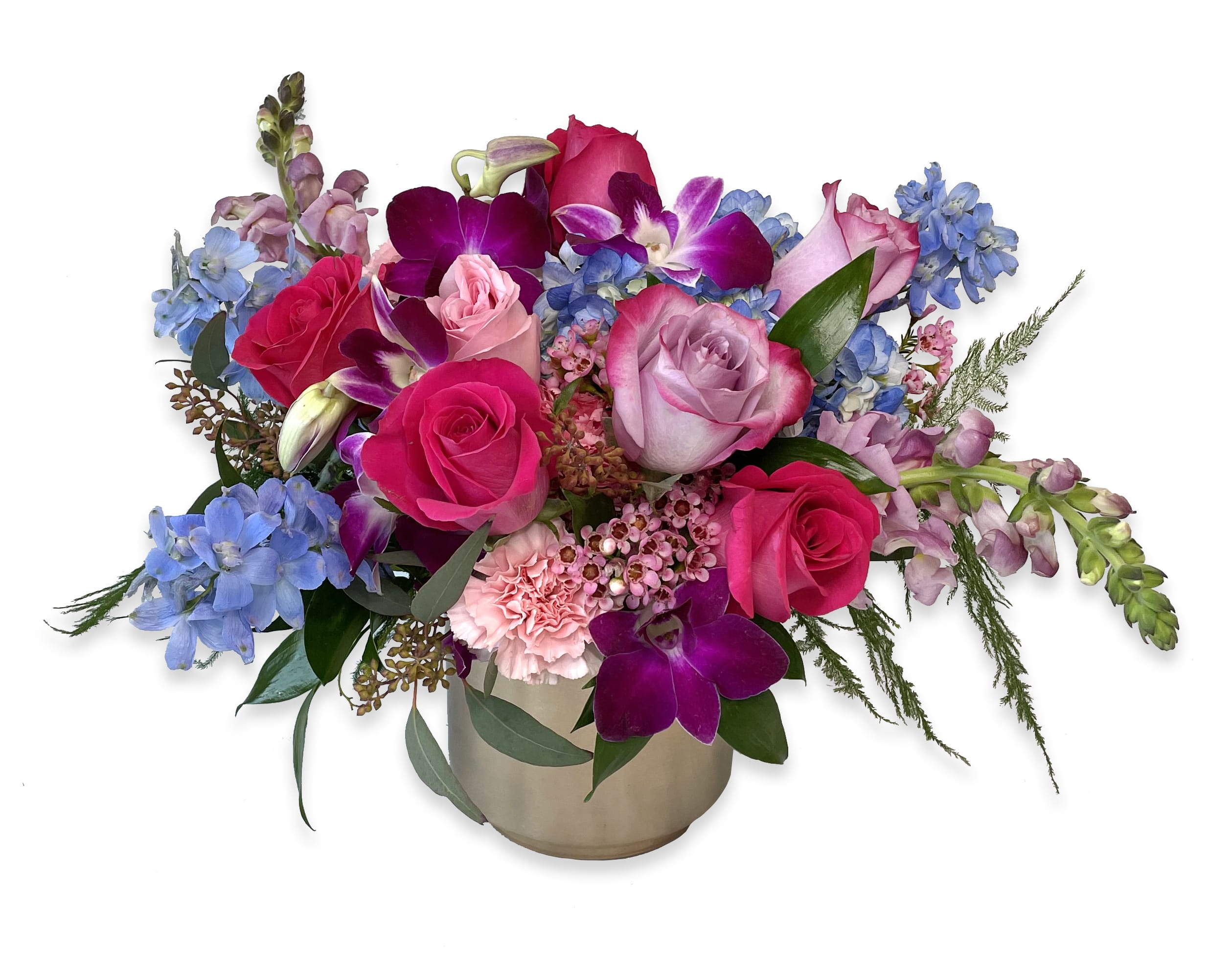 Mixed bouquet of pink roses, purple orchids, and blue flowers in a gold vase