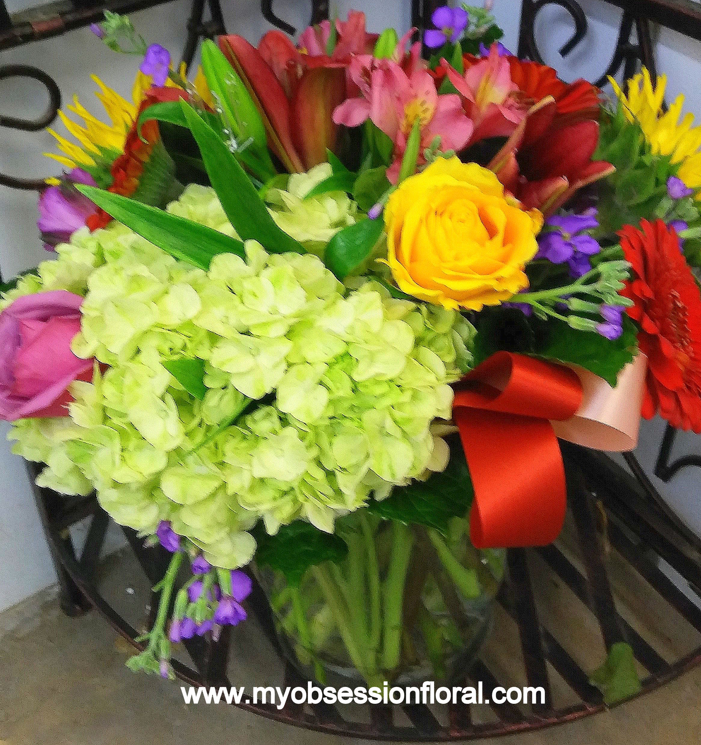 Colorful mixed bouquet with hydrangea, roses, and gerbera daisies