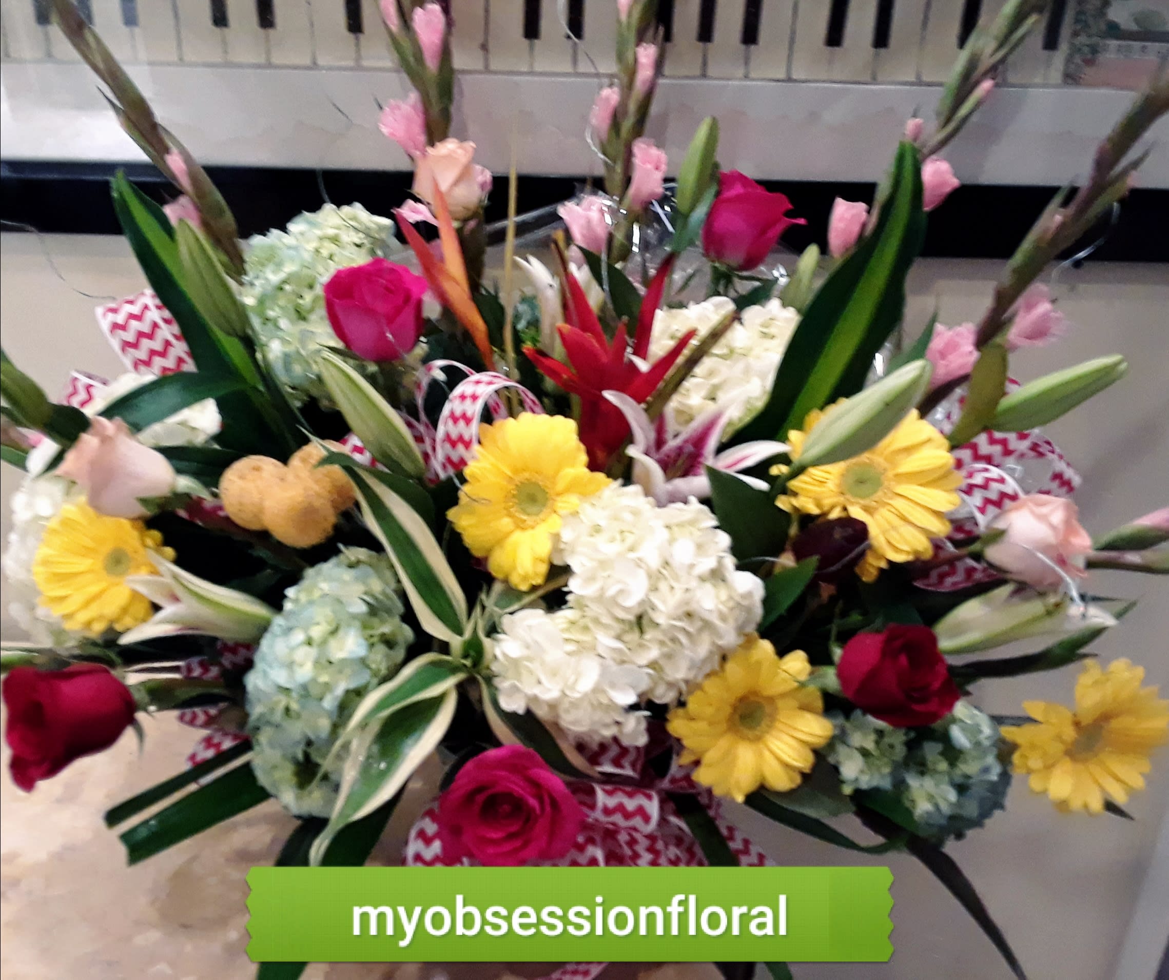 Mixed bouquet with roses, hydrangeas, gerbera daisies, and lilies