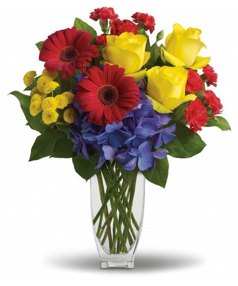 Bouquet of red and yellow flowers in a clear glass vase