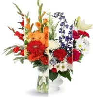 Colorful mixed flower arrangements with red, orange, white, and blue blooms in glass and white vases