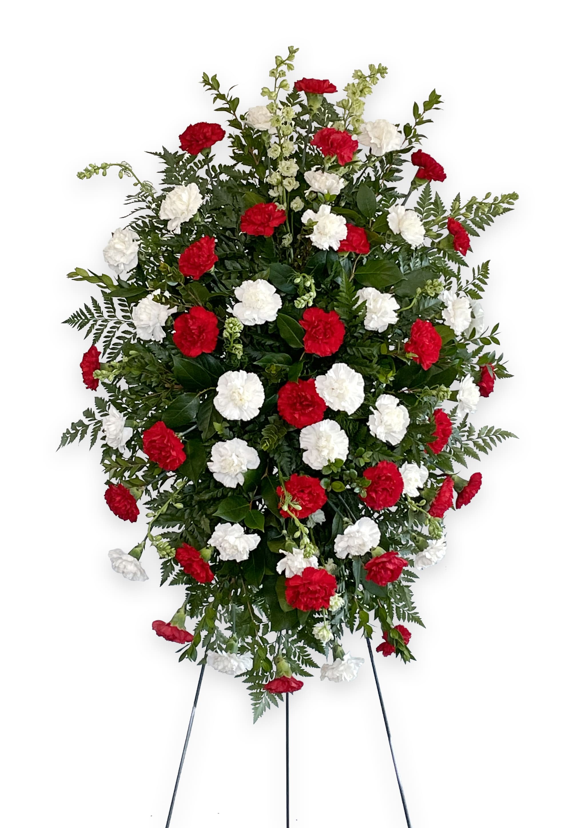 Standing floral spray with red and white carnations on an easel