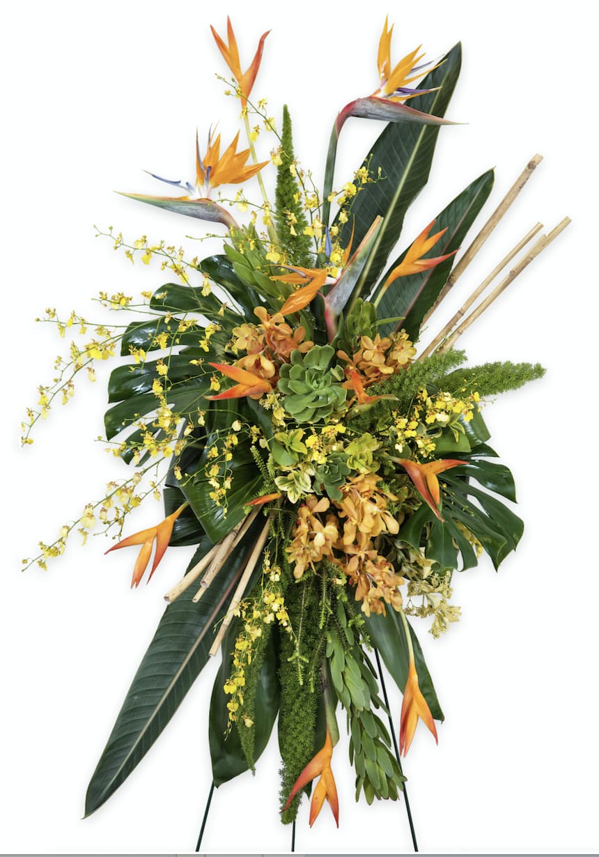 Tall tropical floral spray with orange bird-of-paradise and yellow orchids