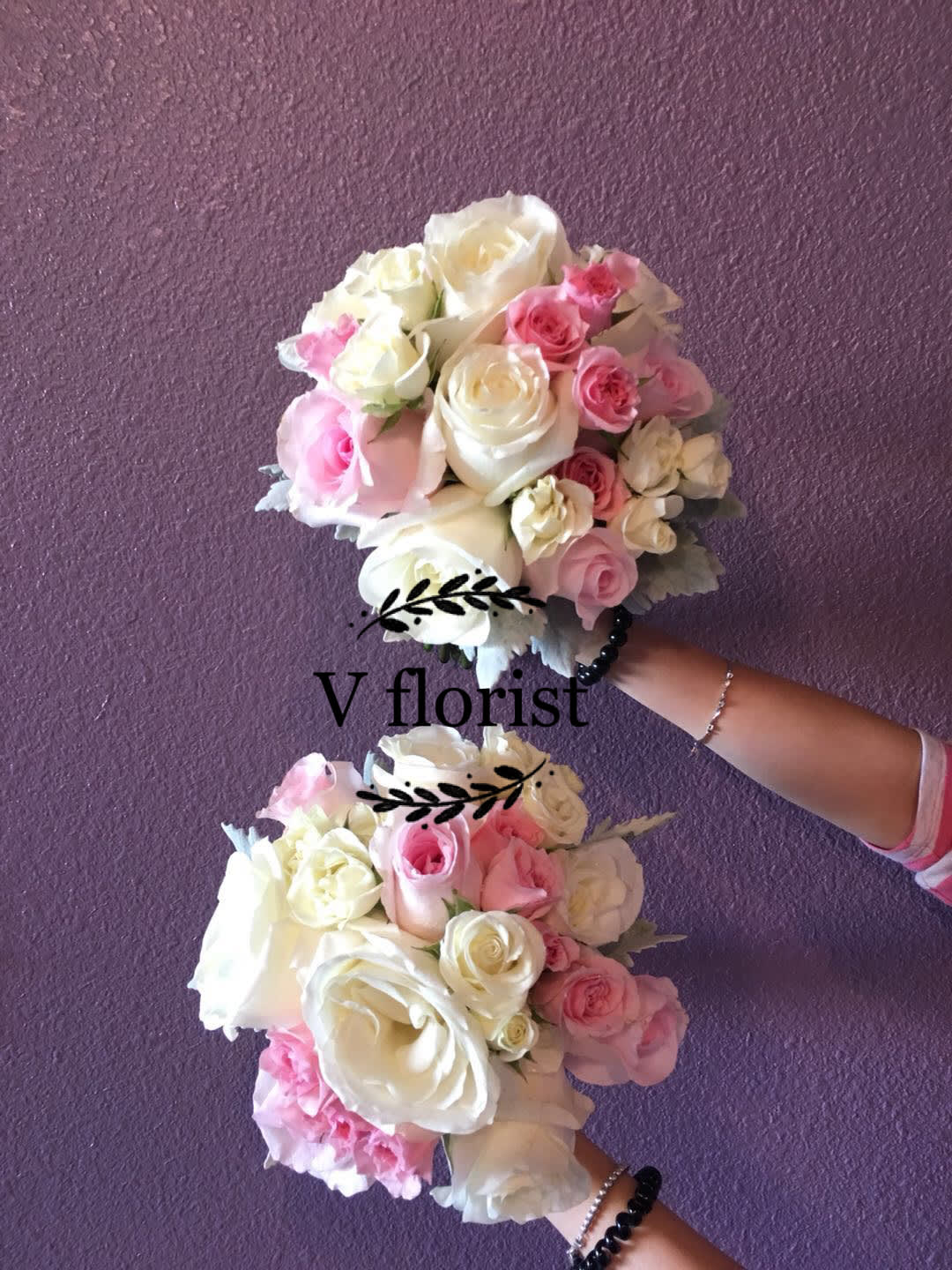 Pink Elegance Mixed Bouquet - With its rich shades of pink and accents of white and green, this elegant mixed bouquet will make every bride feel just like royalty on her special day. Using only the freshest pink roses,white roses, pink spray roses, and white spray roses.our dedicated florists hand design each one.  Hand-crafted bouquet of pink roses,white roses, pink spray roses, and white spray roses bound with crisp white satin ribbon. All of our wedding flowers are hand-designed and arranged at a local florist to ensure they arrive looking their best on your big day Our florists select the freshest flowers available so floral colors and varieties may vary Orders must be placed two weeks in advance to allow for processing