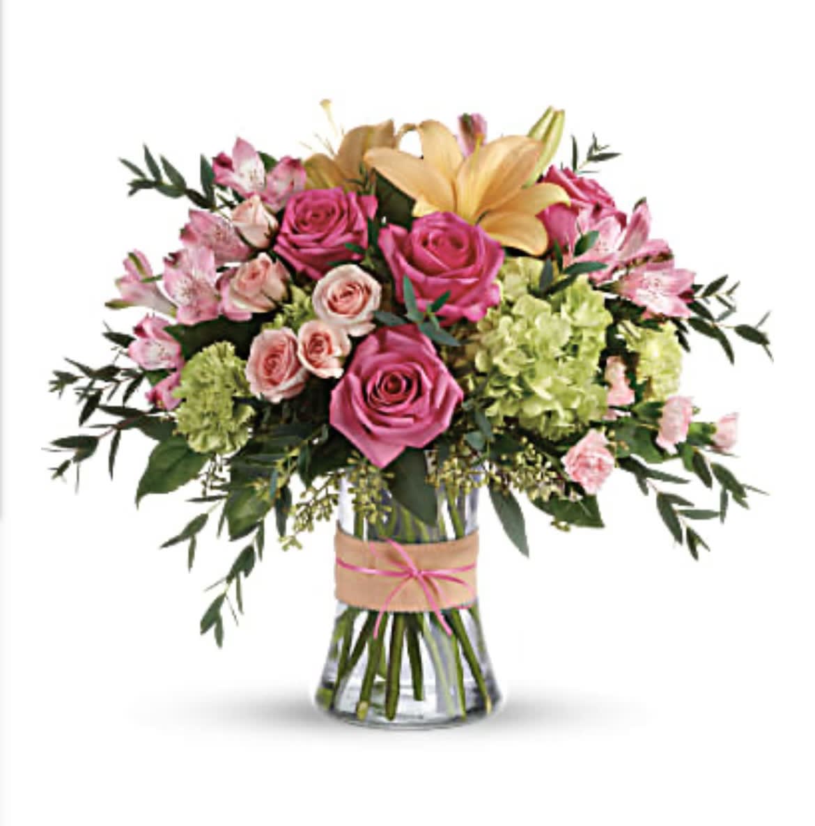 Blush Life Bouquet - DESCRIPTION SIZES Put a spring in their step with this beautifully blushing bouquet of hot pink roses, soft peach lilies and fresh green hydrangea. Arranged in a graceful vase tied with a charming bow, it's a chic treat for any occasion! This sweet arrangement features green hydrangea, hot pink roses, pink spray roses, peach asiatic lilies, pink alstroemeria, green carnations, pink miniature carnations, seeded eucalyptus, parvifolia eucalyptus, and lemon leaf. Delivered in a glass gathering vase. Orientation: All-Around