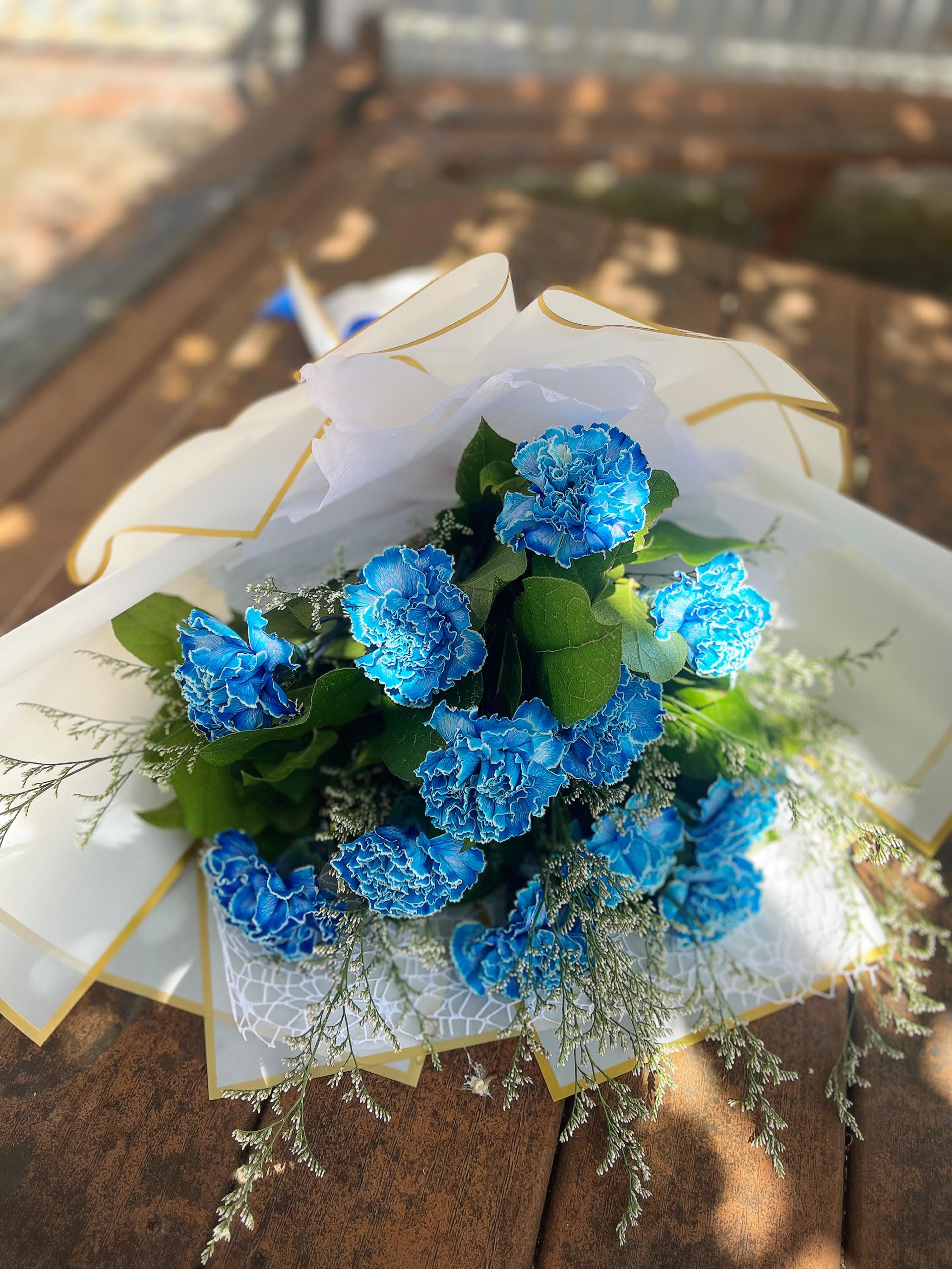 Blue Carnations Wrap - Includes 12 carnations 