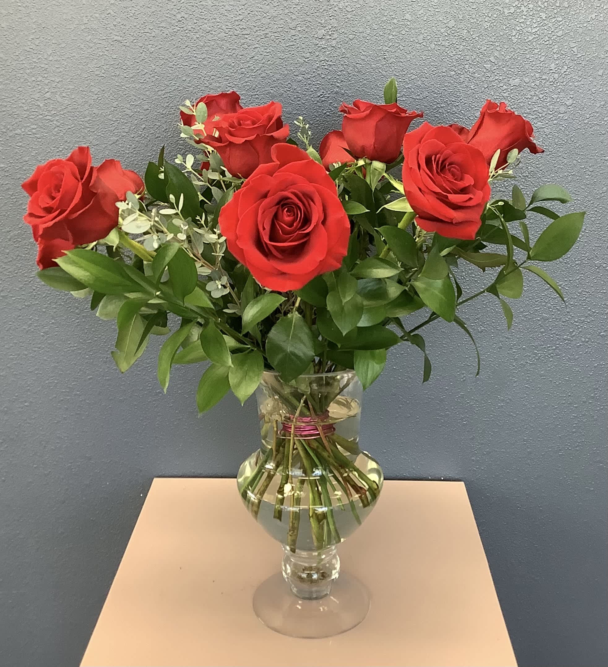Always On My Mind - One Dozen red, tall, premium, Ecuadorian roses designed beautifully in a pedestal vase for that special someone. Each upgrade adds an additional dozen roses.  You can always request different colors at checkout in "florist instruction", upon availability, default color will be red. VALENTINES COLOR will be RED only. SUBSTITUTIONS are not allowed at that time.