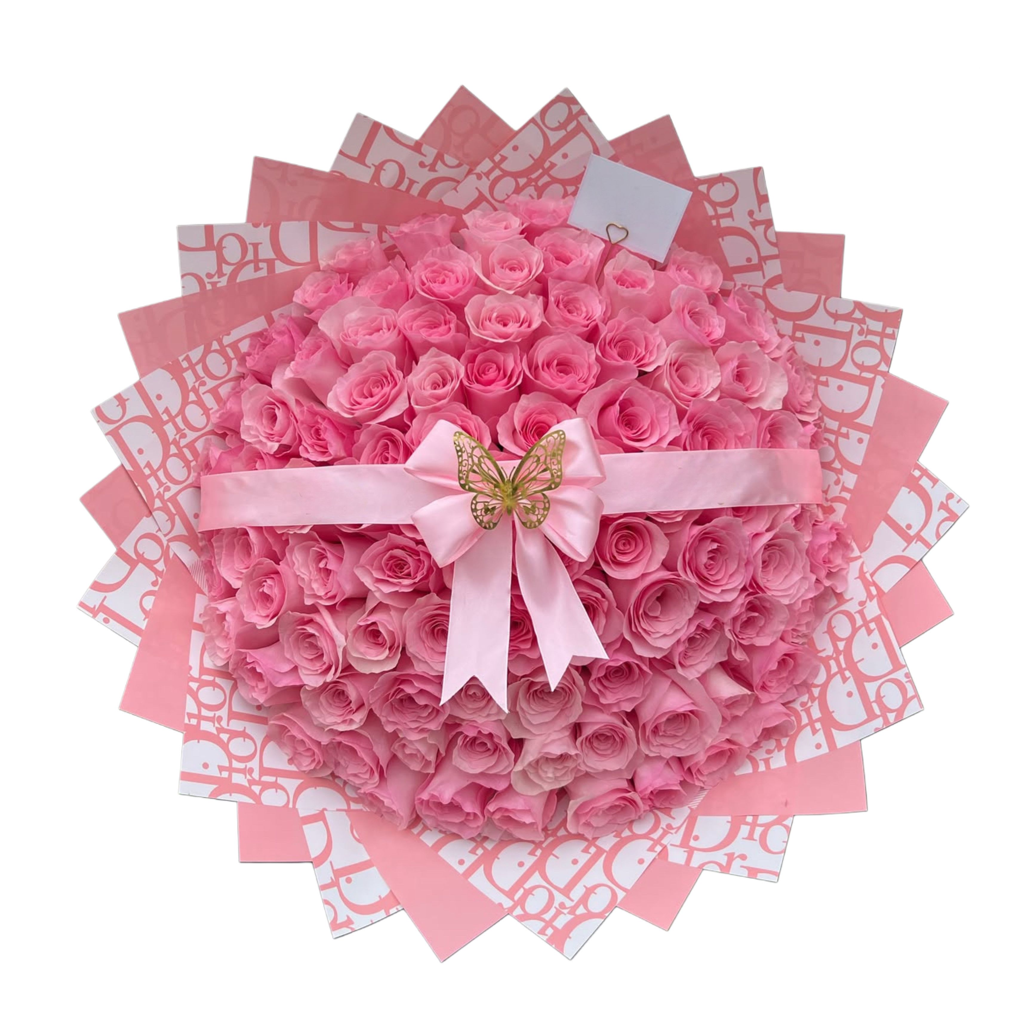 Dior Pink Bloom - A stunning arrangement of premium roses wrapped in our signature luxury Dior style. Soft, timeless, and beautifully crafted for any occasion where elegance speaks louder than words