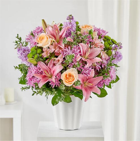 Supportive Embrace Tabletop Basket -  Pet Friendly? No – This arrangement contains Asiatic Lilies, which are highly toxic to cats and can cause kidney failure. Please keep this basket out of reach of household pets or choose a lily-free option for homes with curious cats.    Human Allergy Note : Warning: This arrangement contains pollen-heavy Asiatic Lilies and Asters. To reduce irritation, consider snipping the orange pollen anthers from the lilies as they open.   Care &amp; Longevity : This arrangement is composed in floral foam. To ensure longevity, check the water level daily by feeling the foam; add lukewarm water to keep it moist but not overflowing. Remove fading blooms to prevent mold growth. Keep the basket away from direct sunlight, heating vents, or drafty windows to prevent the Snapdragons and Lilies from wilting prematurely.   Best Occasions &amp; Situations : - Sympathy for the home - Memorial service tribute - Get well wishes - I’m sorry - Thinking of you - Retirement tribute - Funeral tabletop display   Why Customers Love It : - Classic White Palette: Offers a timeless, elegant look that fits any decor. - Gift-Ready Basket: No vase needed, making it easy for recipients to accept and display. - Versatile Design: Low-profile “tabletop” height is perfect for kitchen islands or end tables. - Symbolic Meaning: Represents purity and peace during times of grief.