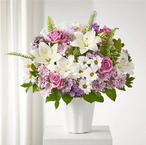 Warmest Thoughts Tabletop Basket -  Pet Friendly? No – This arrangement contains Chrysanthemums and Daisies, which are toxic to household pets if ingested. Keep this basket on a high surface and away from curious cats or dogs.   Human Allergy Note : Contains Gerbera Daisies and Chrysanthemums, which are known to produce pollen that may trigger sensitivities. To minimize irritation, keep the arrangement in a well-ventilated area rather than on a bedside table.    Care &amp; Longevity : This arrangement is designed in floral foam. To extend its life, check the moisture level daily and add fresh water to the center of the basket. Avoid placing it in direct sunlight, near heating vents, or under ceiling fans. As blooms like Roses or Daisies begin to fade, gently remove them to keep the remaining flowers healthy.   Best Occasions &amp; Situations - Sympathy &amp; Memorial - Get Well / Comfort - Thinking of You - Housewarming - Retirement flower - Funeral Service   Why Customers Love It : - Cheerful color balance that brightens even the smallest rooms. - The handled basket is easy to move and can be reused as decor. - Compact tabletop size makes it a gift-ready presentation for hospitals or offices. - Long-lasting Carnations and Mums ensure the gift stays beautiful for days.