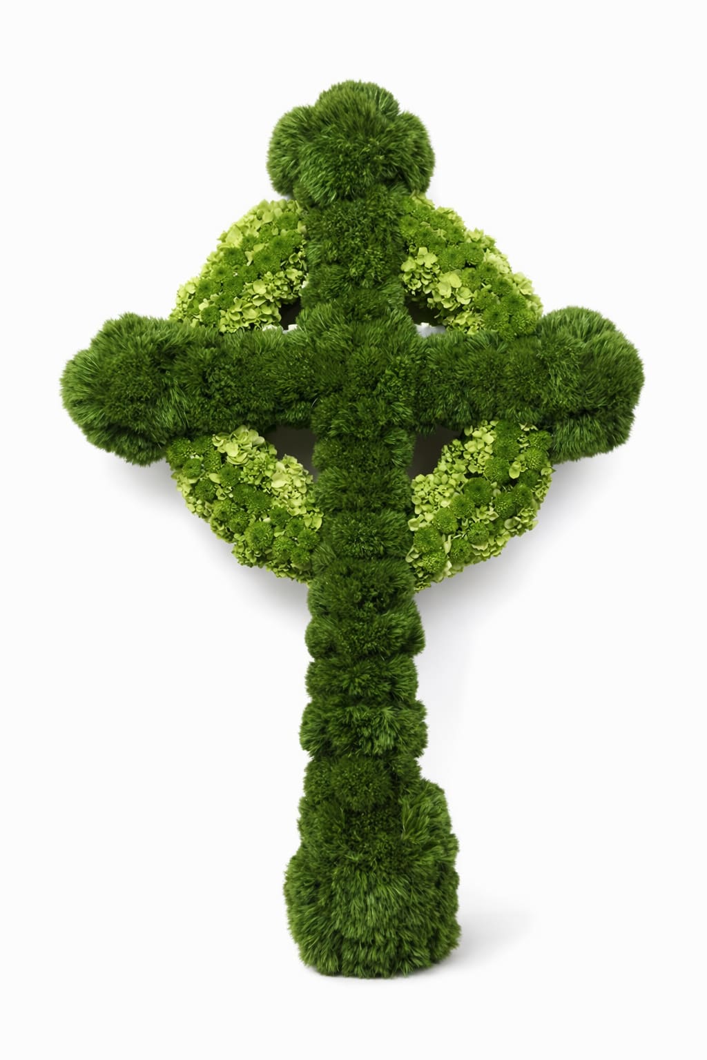 Green floral cross made of mossy blooms and hydrangeas