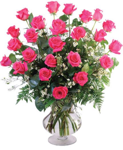 Pink roses arranged in a clear glass vase
