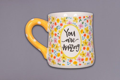 Floral-patterned mug with the words "You are Amazing"