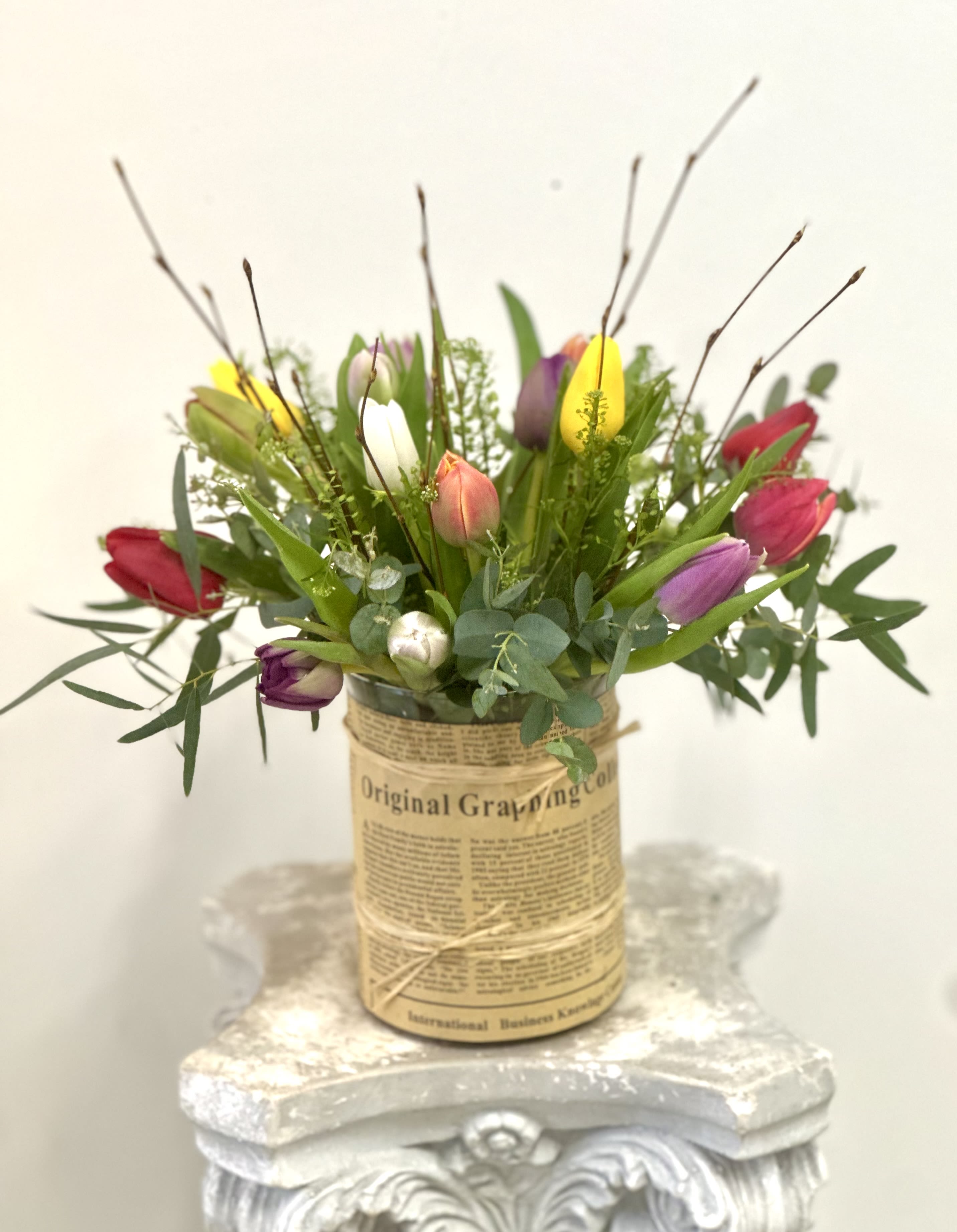 Spring Tulips by Westford Florist Art by Veny - Spring has sprung and we've got the perfect treat for your eyes and nose! Westford Florist Art by Veny Spring Tulips vase arrangement is a stunning display of carefully selected, expertly arranged tulips that will add a pop of color and sophistication to any living space. With meticulous attention to detail and love poured into every petal, this one-of-a-kind bouquet is truly a work of art. From birthdays to anniversaries or just because, our Spring Tulips make the perfect gift for any occasion. Sourced from top-notch growers worldwide, these tulips are guaranteed to impress even the most discerning individuals. Treat yourself or a loved one to the beauty of nature with our exquisite Spring Tulips from Westford Florist. Order now and let us bring the essence of spring indoors with our luxurious bouquet. Offer valid until supplies last.  
