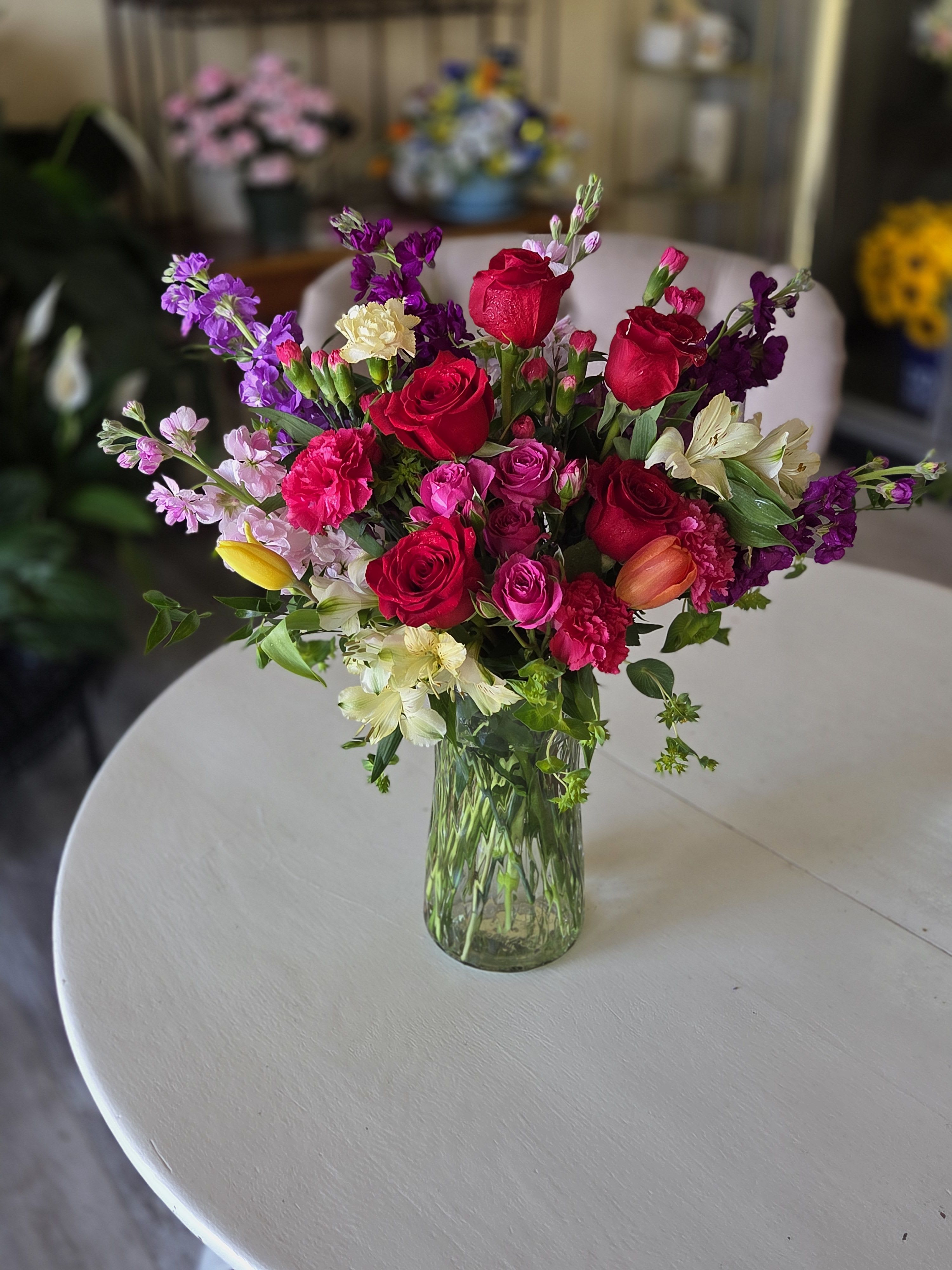 Juliette - This combination of jewel tones and sweet flowers would be most welcome when delivered to that special person for occasion. Let today be the day! 