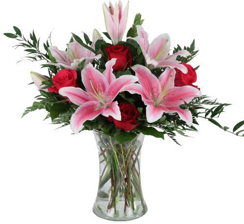 Two Hearts - Our original Two Hearts arrangement showcases beautiful red  and pink roses with stargazer lilies for your special someone on Valentine's Day.