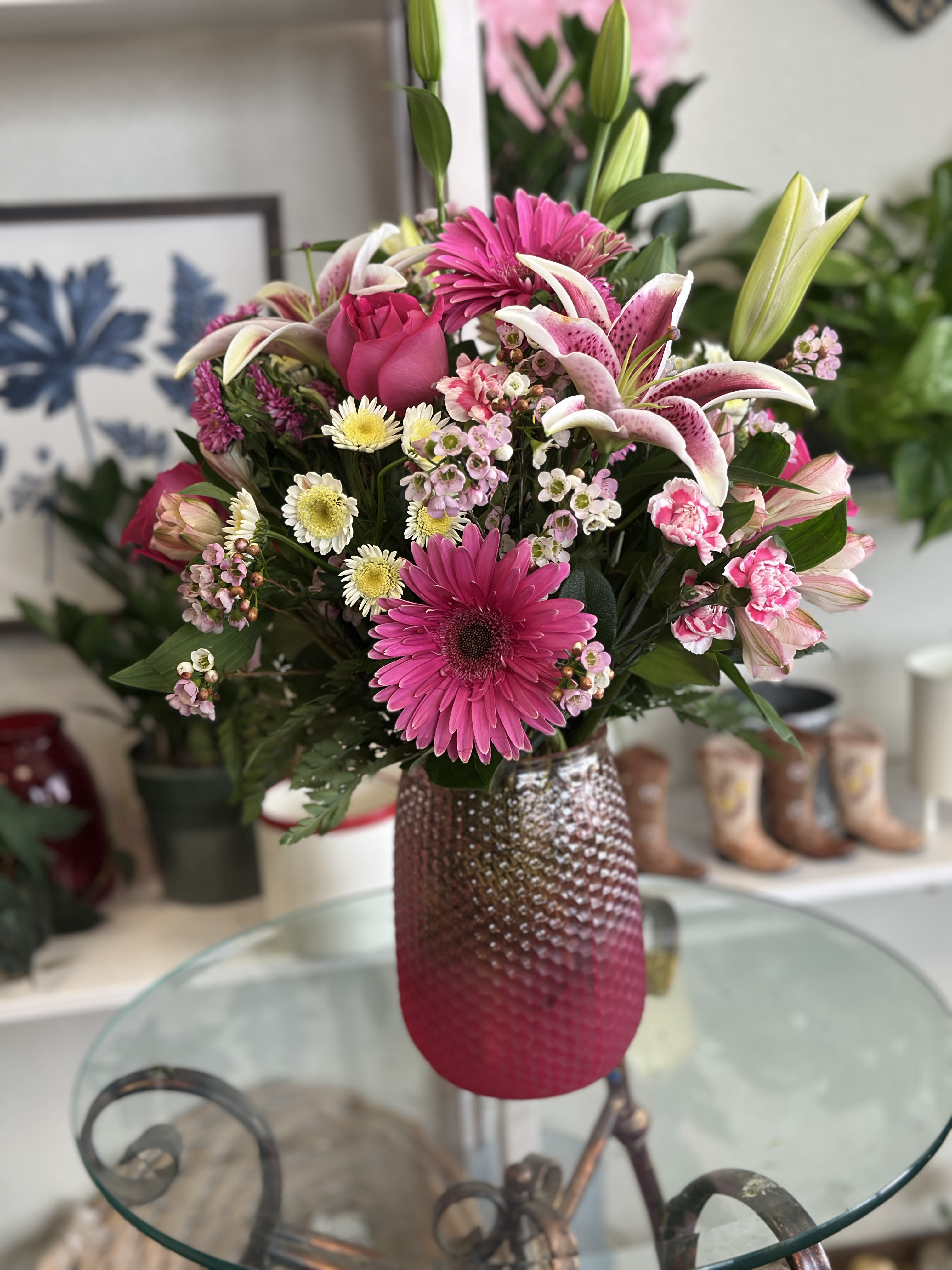 Pink and white mixed bouquet in a textured vase