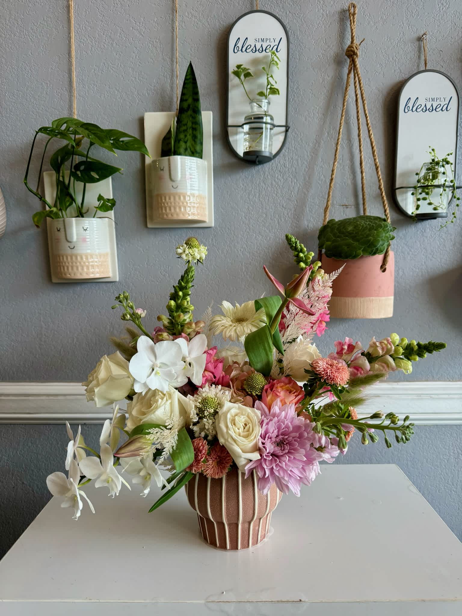 Midwestern Belle  - For the terracotta lovers. Send your Midwestern belle a pink and white with accents of lavender and dried florals.