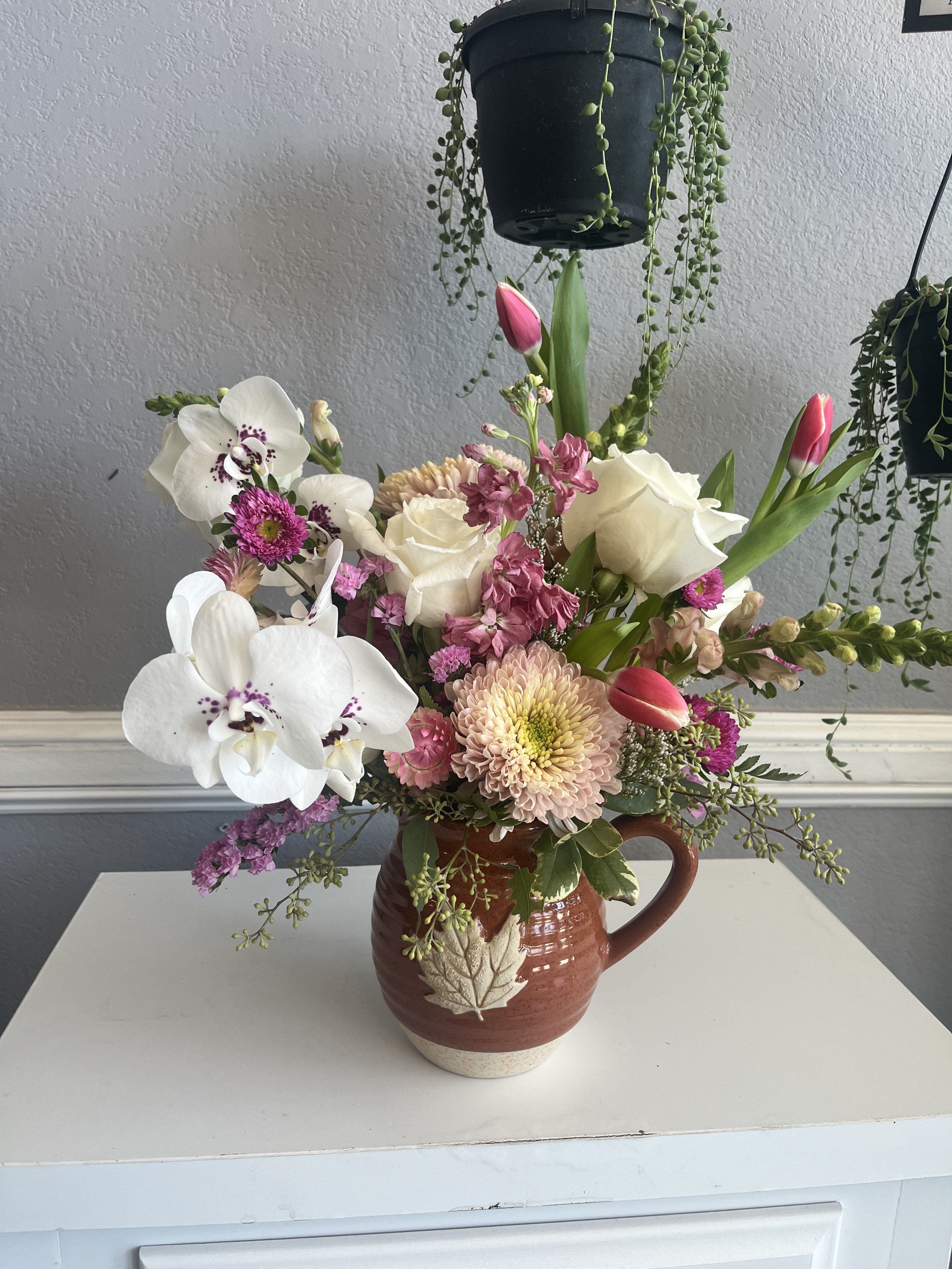 Maple  - Elegant arrangement in a maple pitcher perfect for this fall