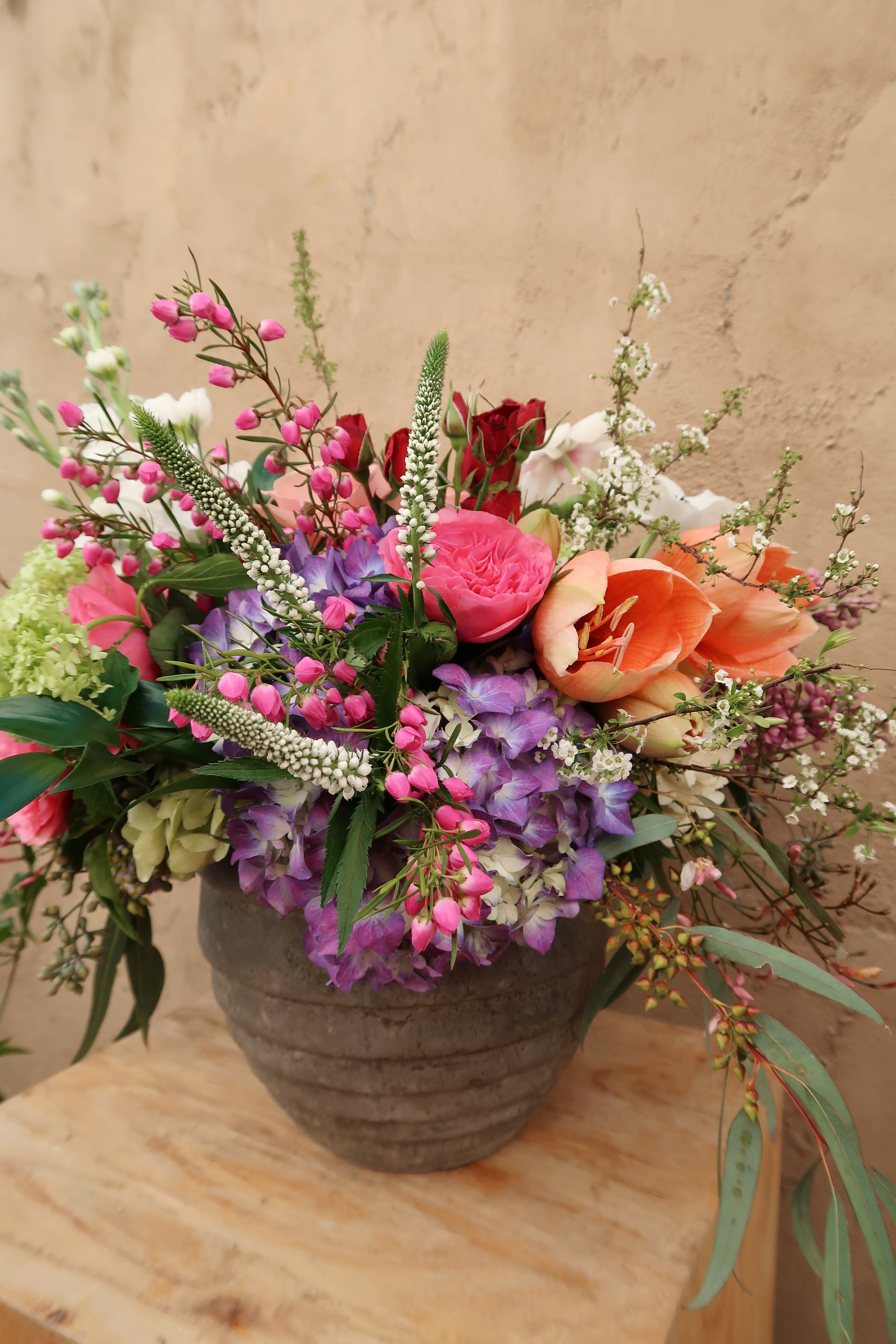 Summer Garden - Mother's Day 2019 Exclusive Collection. Summer Garden features our stunning ceramic vase imported from the beautiful Indonesian Island Bali, filled with the seasons flowers.  Flowers may vary due to availability, and to ensure fresh flowers. 