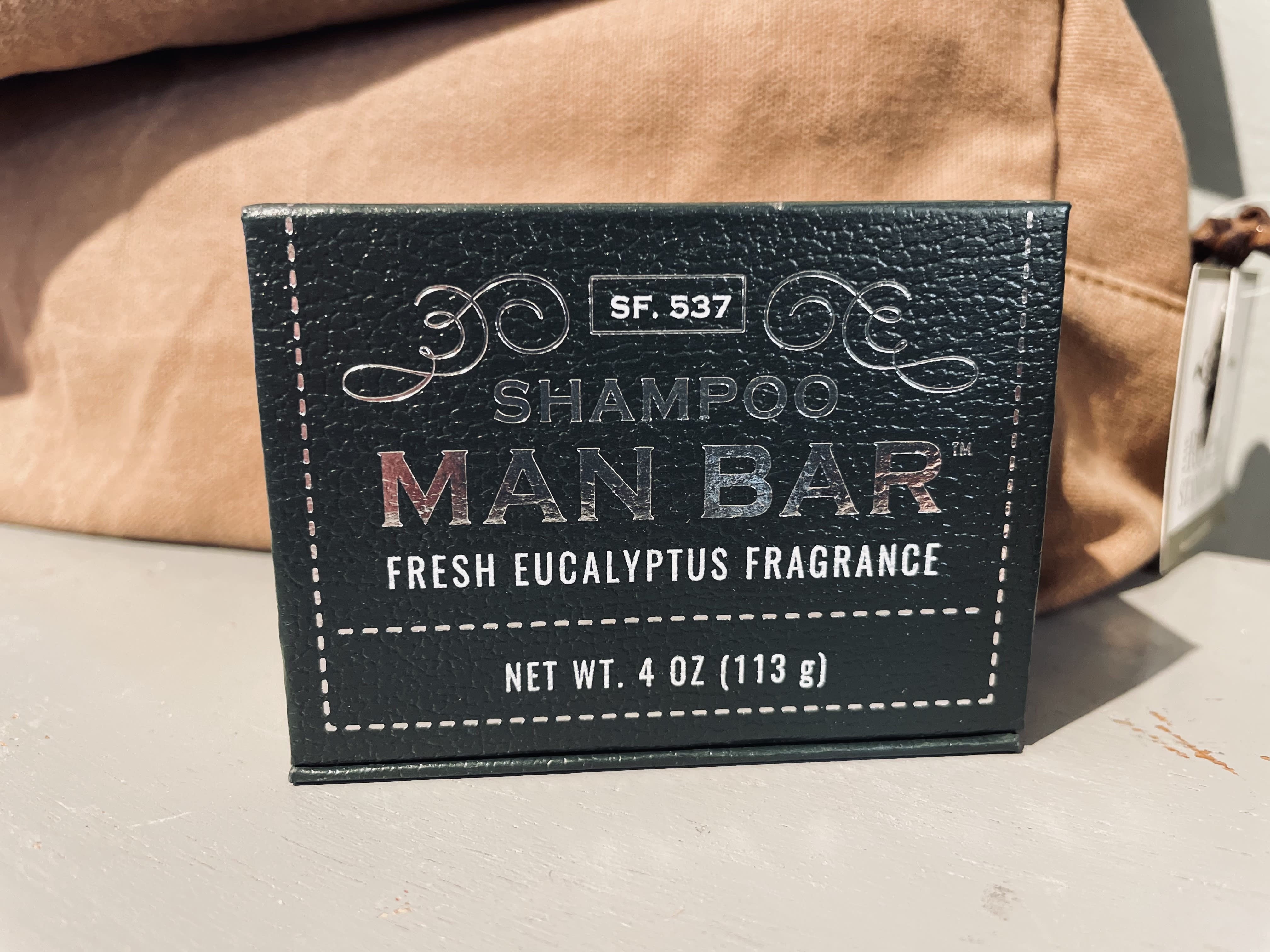San Francisco Soap Company - Shampoo Man Bar - 4oz - This shampoo bar will leave your hair soft and lightly scented with a fresh, masculine fragrance.  Scents: Tea Tree + Mint Cedar + Sandalwood  Fresh Eucalyptus 