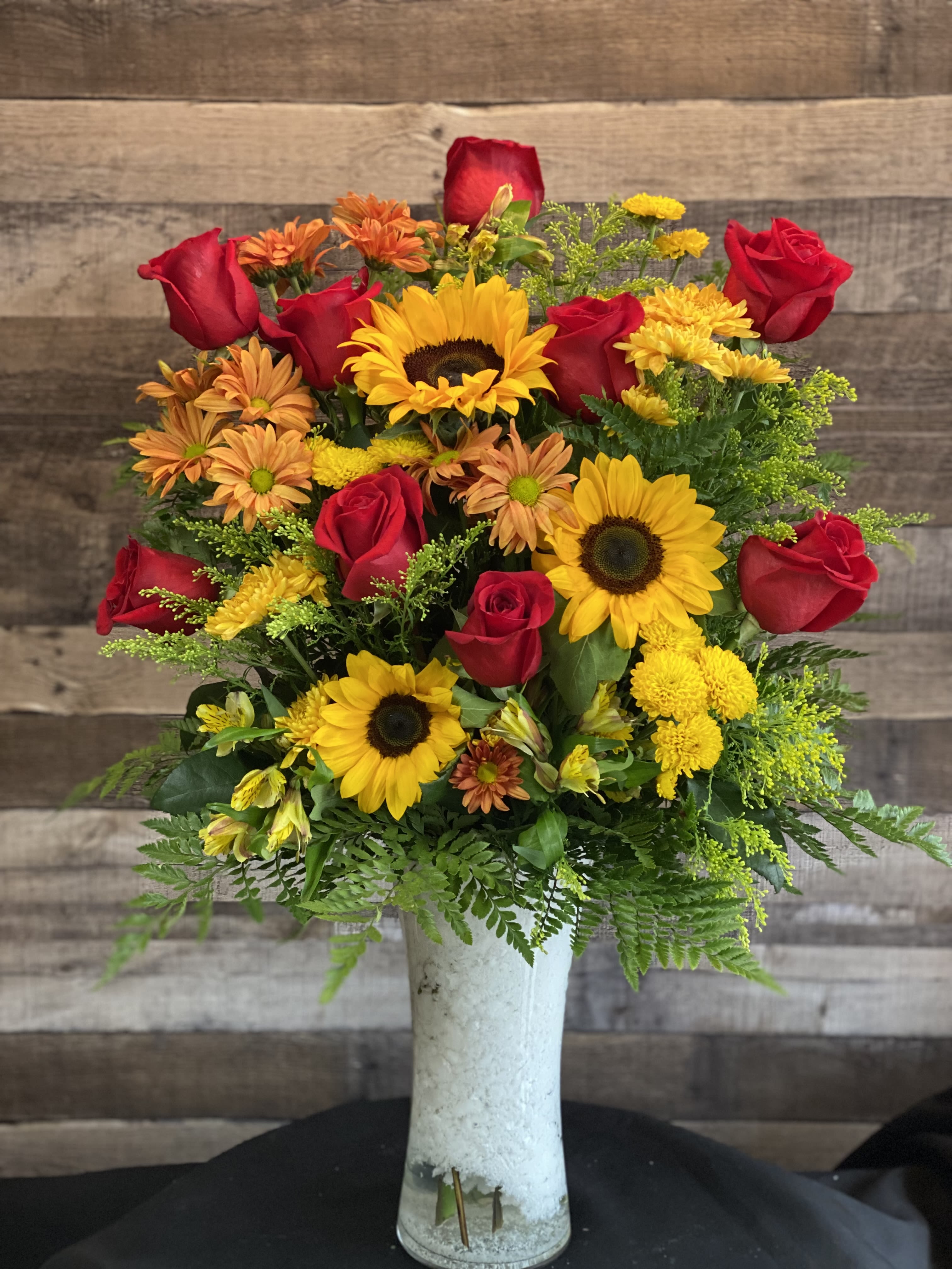 Fallin 4 U - A bright bouquet gathered with warm blooms, ready to fill the room with happiness and warmth. 