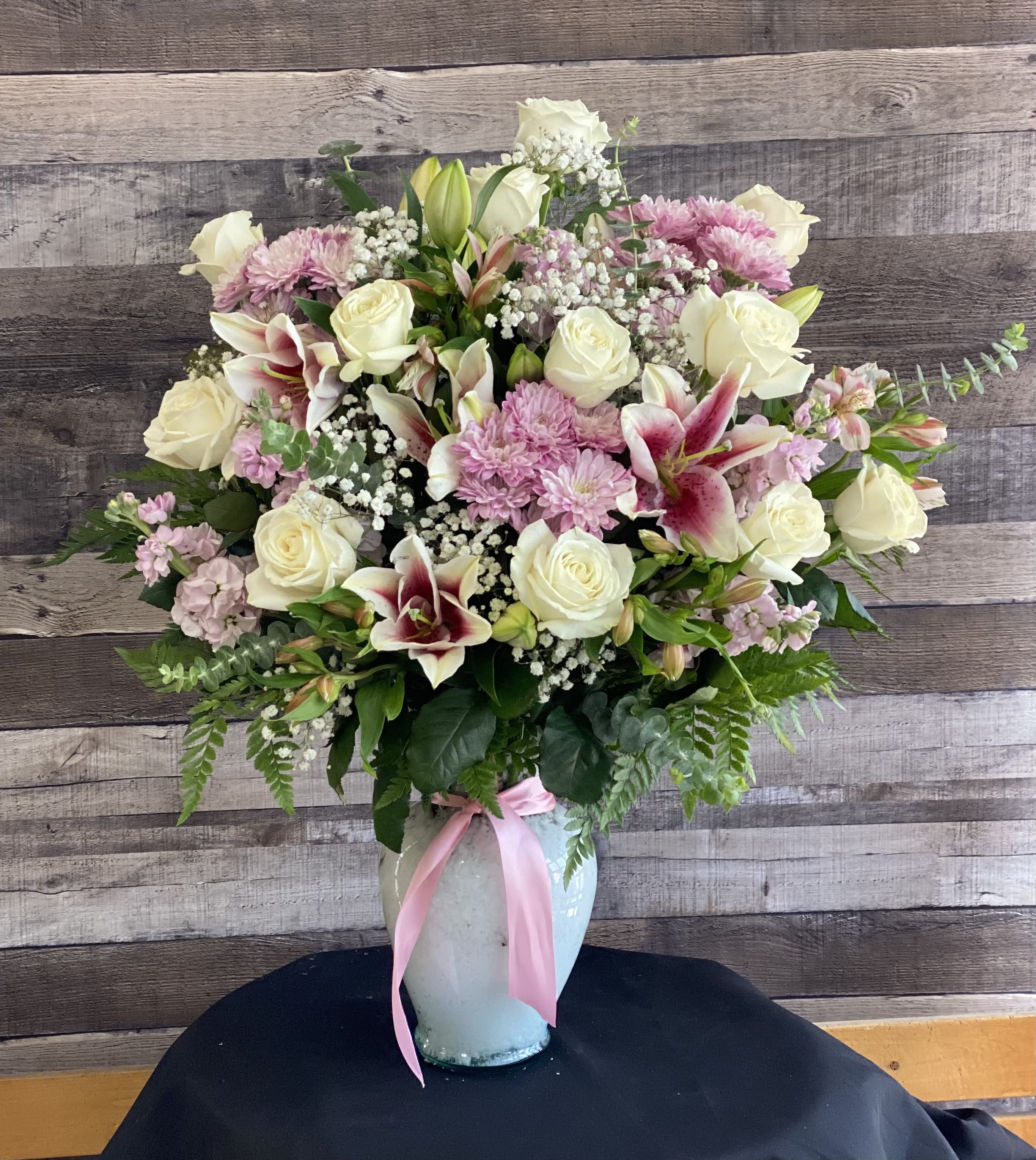 Graceful Pinks  - This graceful hand designed bouquet is a great way to make a peaceful heart warming gesture. 