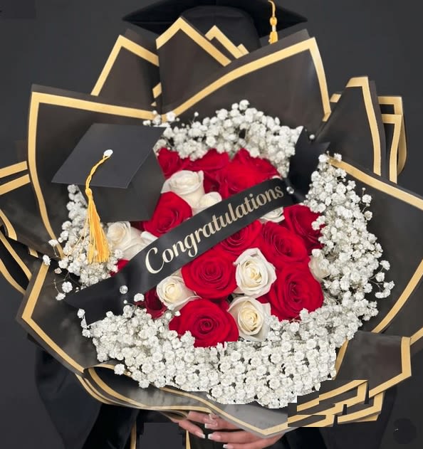 Congratulations    Graduation Bouquet  - Elegant, graceful, and made for her proudest moment.  25 red and white roses arranged inside a delicate baby's breath rim, wrapped in sleek black paper with gold trim, and finished with a graduation cap topper and a "Congratulations" banner.
