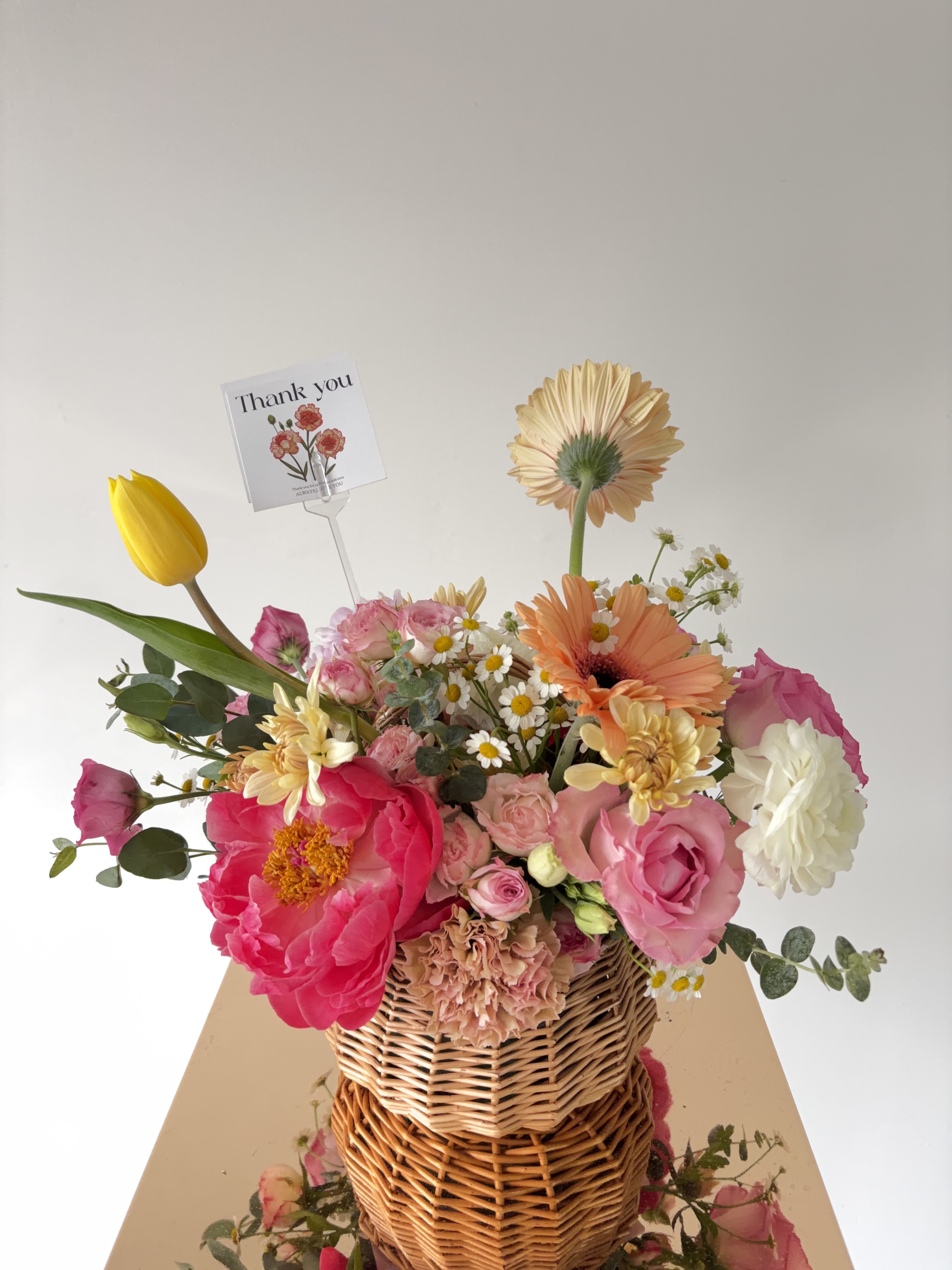 Agape’s Enchanted Love Basket  - Please keep in kind that no arrangement can be made identical to the photos shown (as some flowers are seasonal). Therefore, we will substitute them accordingly with in-season flowers instead. We will do our absolute best to arrange the flowers as similar as possible with the photos shown!   For Bouquets, we DO NOT include vases unless you add one.  For Vased Flowers, we include vases.   Right now, you can expect blooms sourced from local farms.   We use small ordinary 4in by 3in cards. If you want to send flowers with a special messaging card, please choose one from add-ons!  Delivery: our standard delivery time window is between 3:00pm and 5:00pm.   If you have any questions regarding the order, please feel free to contact us!   Email: agapeflower.studio25@gmail.com
