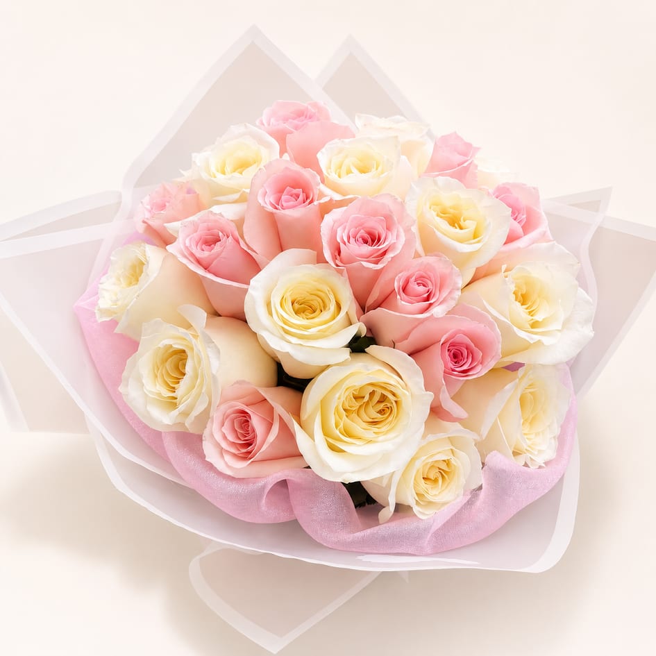 Blush Sweet Elegance - A graceful bouquet featuring delicate white and pink roses, thoughtfully arranged to create a soft and romantic harmony. Wrapped in fine pastel-toned materials, this arrangement conveys tenderness, gratitude, and pure love—perfect for any special occasion.
