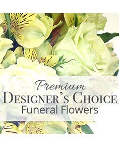 Soft yellow and cream flowers with a Premium Designer's Choice Funeral Flowers text overlay