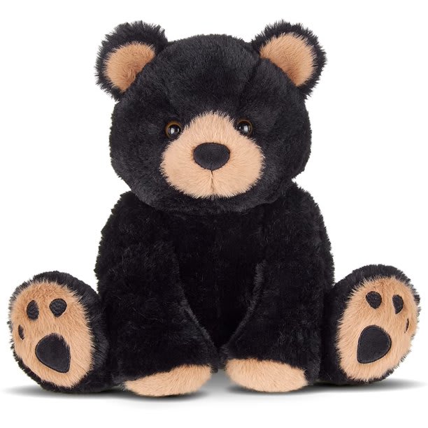 Black plush bear with tan muzzle, ears, and paw pads sitting upright
