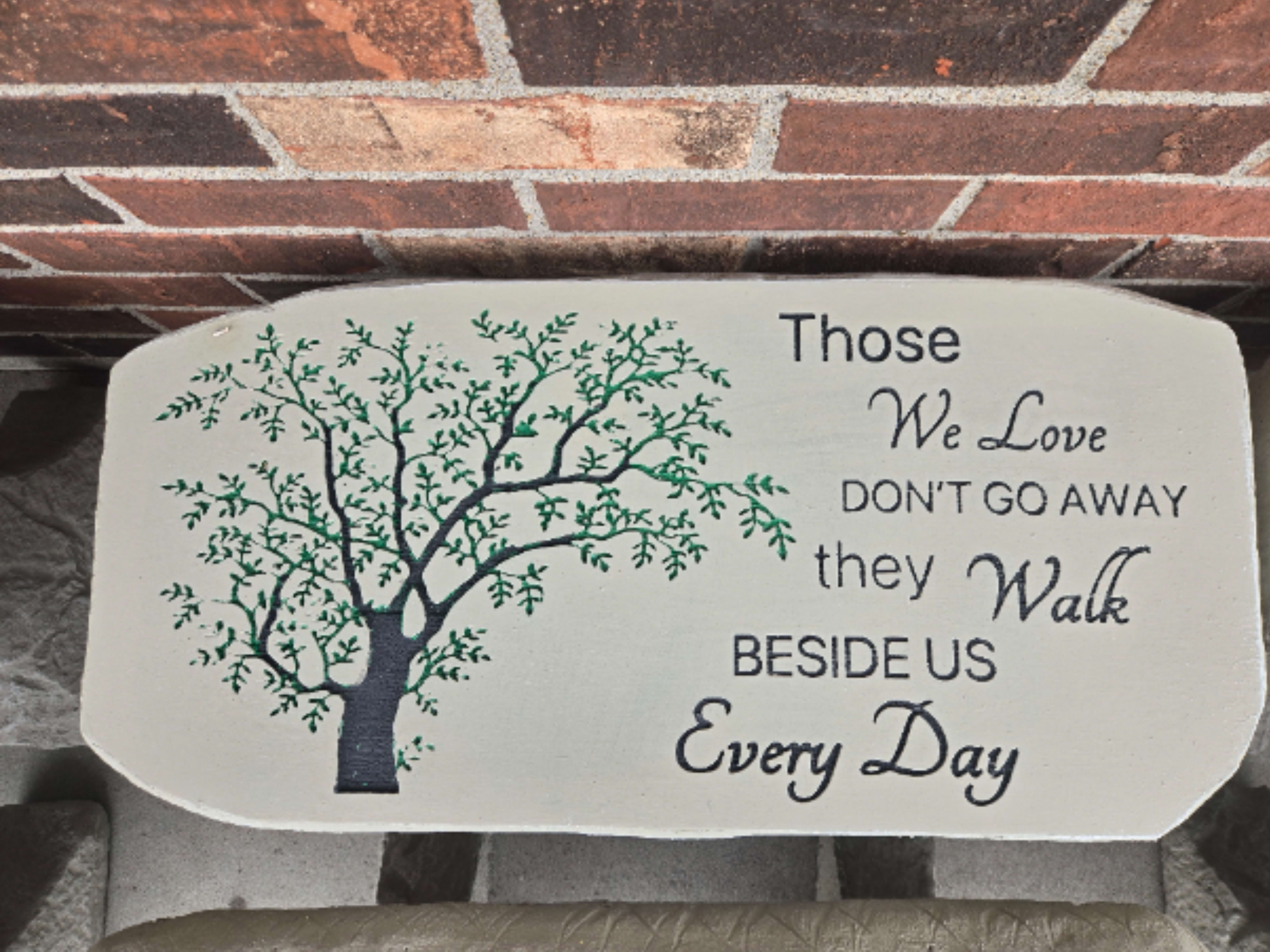 Green Tree "Those We Love" Bench - Concrete bench with green tree engraved.