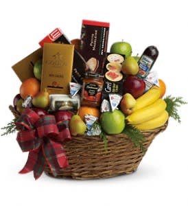 The Ultimate Christmas Basket - The ultimate crowd pleaser, this basket is simply overflowing with deliciousness. It's sure to make a big impression on anyone from the boss to friends and family.